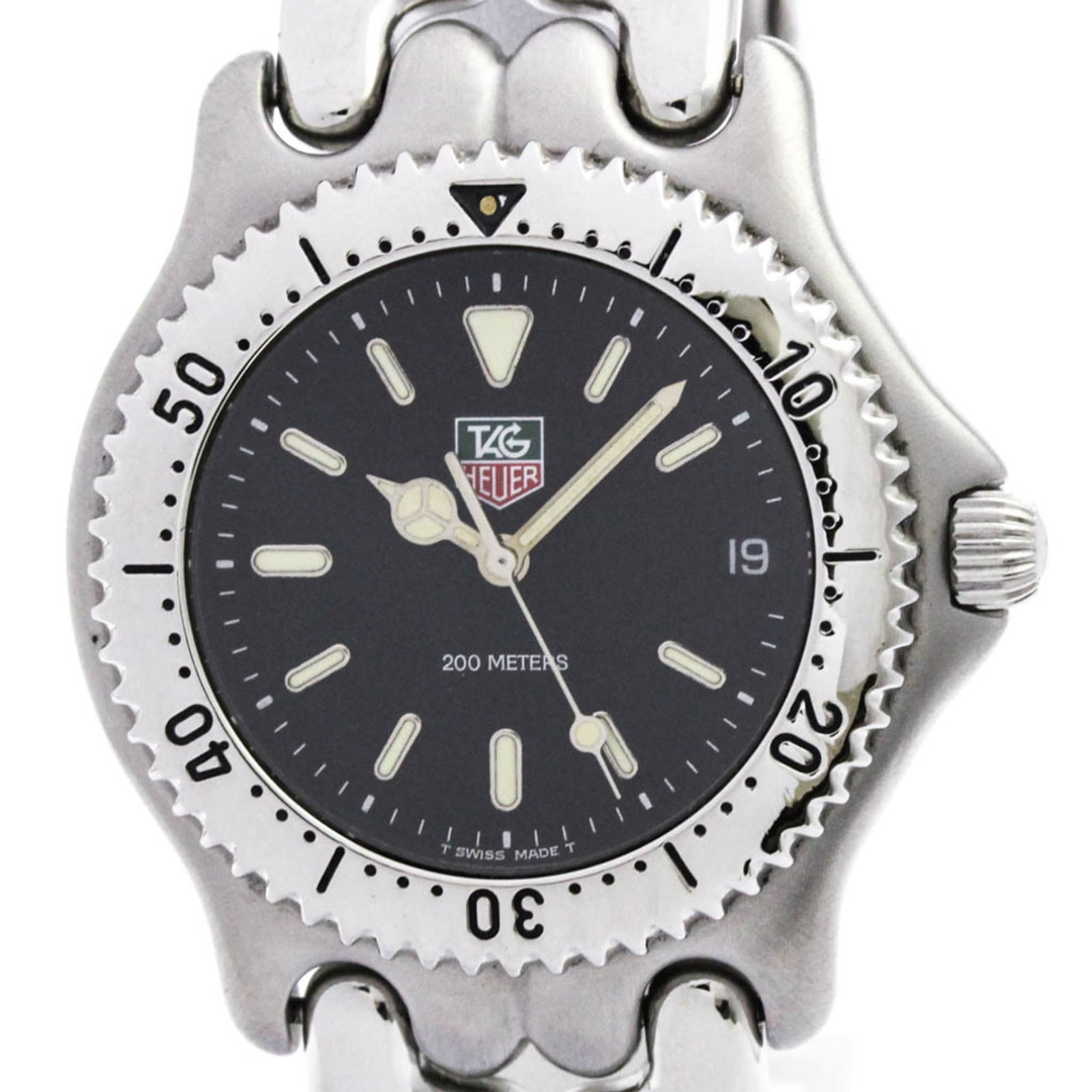 Wristwatch Tag Heuer: Wristwatch Tag Heuer A sleek and sophisticated timepiece, this Tag Heuer wristwatch boasts a classic 38mm stainless steel case and band, perfect for dressing up any formal occasion. With its black dia