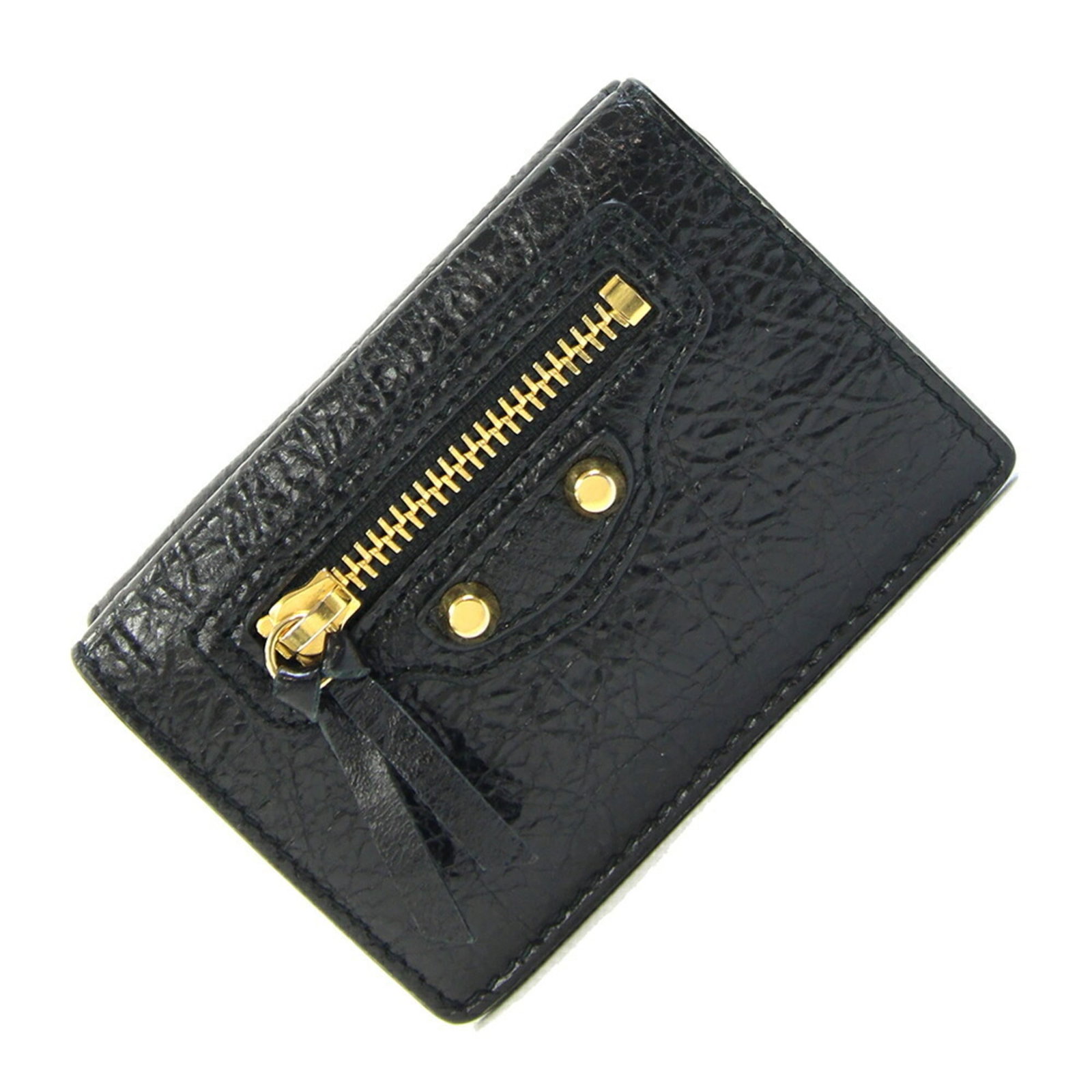 Balenciaga Tri-Fold Leather Wallet: Balenciaga Tri-Fold Leather Wallet A sleek and sophisticated accessory for the modern woman, this Balenciaga tri-fold leather wallet boasts a timeless design with clean lines and premium materials.