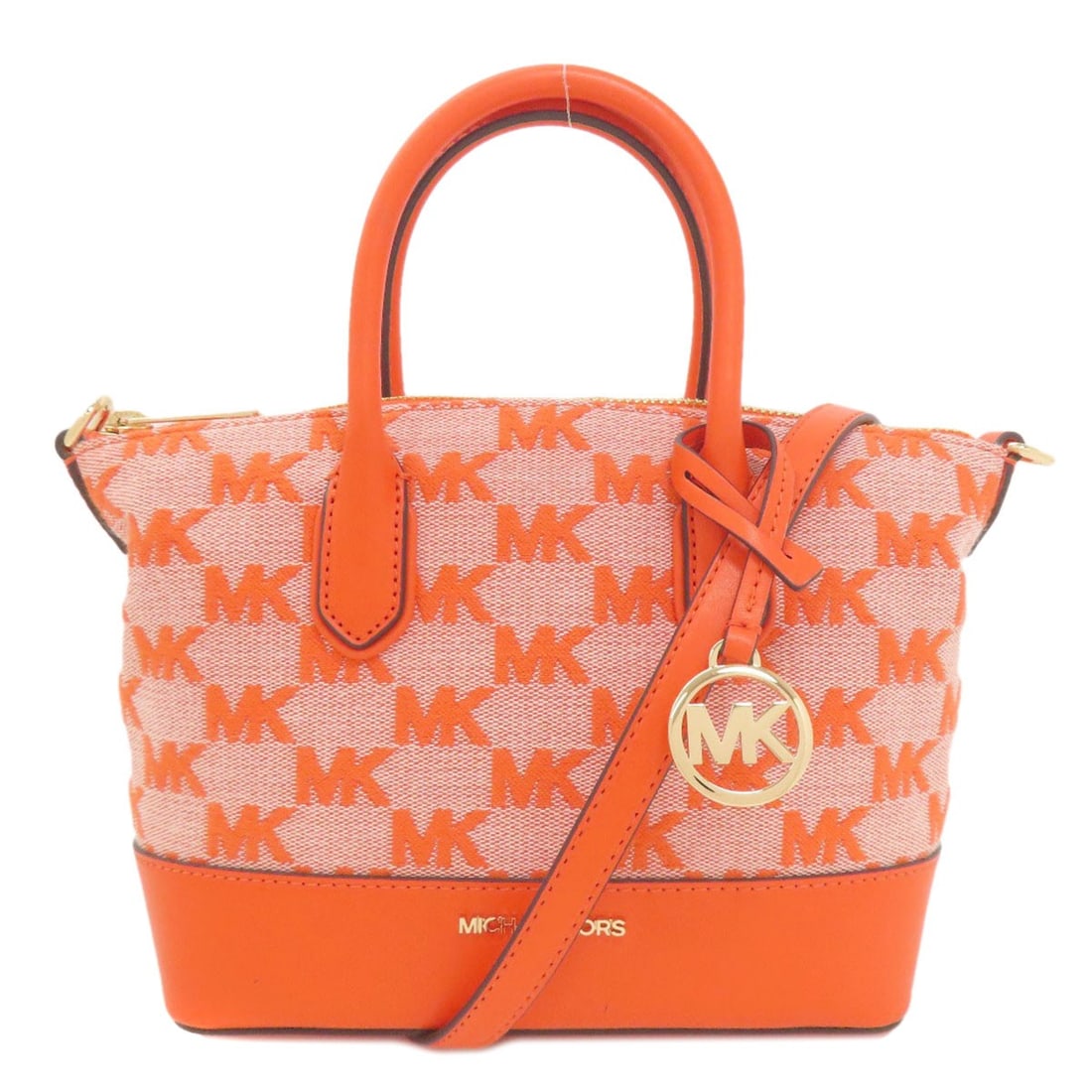 Canvas Michael Kors Hide 2WAY Handbag: Canvas Michael Kors Hide 2WAY Handbag Make a statement with the vibrant orange Canvas Michael Kors Hide 2WAY Handbag, boasting a unique 2-way design that seamlessly transitions from day to night. Craf