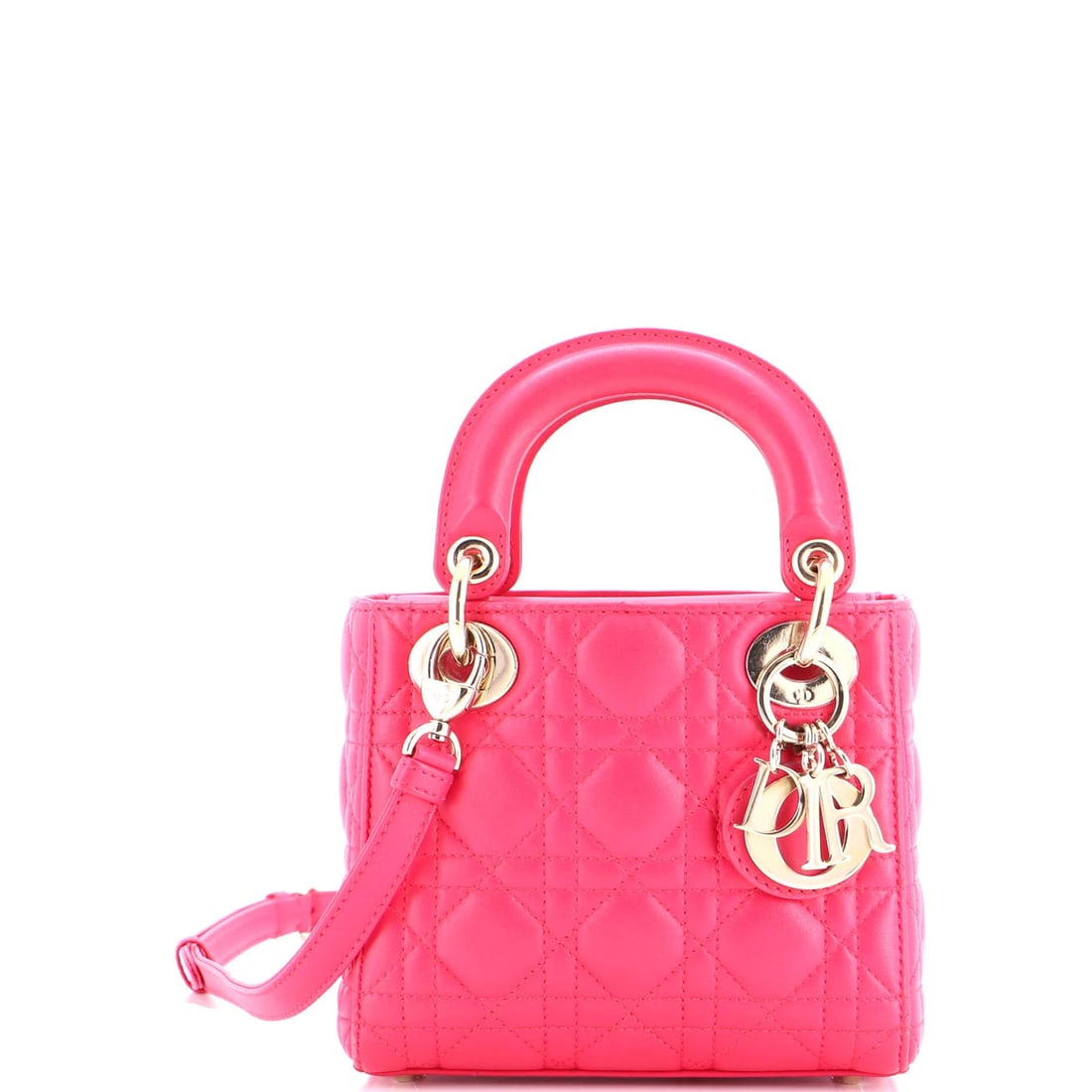 Christian Dior Lady Bag Cannage Quilt Lambskin Mini: Christian Dior Lady Bag Cannage Quilt Lambskin Mini The Christian Dior Lady Bag Cannage Quilt Lambskin Mini is a stunning, pink leather mini bag that exudes effortless elegance. With its signature qui