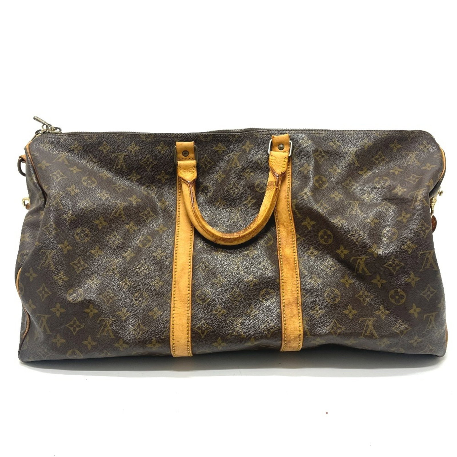 Monogram Louis Vuitton Boston Bag: Monogram Louis Vuitton Boston Bag A pre-owned Louis Vuitton Boston Bag in rich brown monogram, boasting the iconic LV signature and timeless design that exudes sophistication and elegance. With its sp