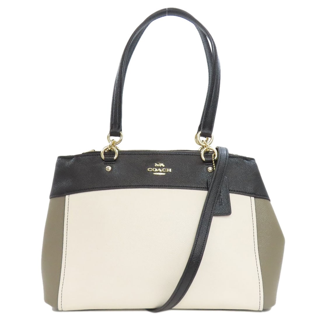 Leather COACH F24549 2WAY Handbag: Leather COACH F24549 2WAY Handbag A timeless classic, the COACH F24549 2WAY Handbag boasts sleek, monochromatic brown and white leather accents that add a touch of sophistication to any outfit. Its ve