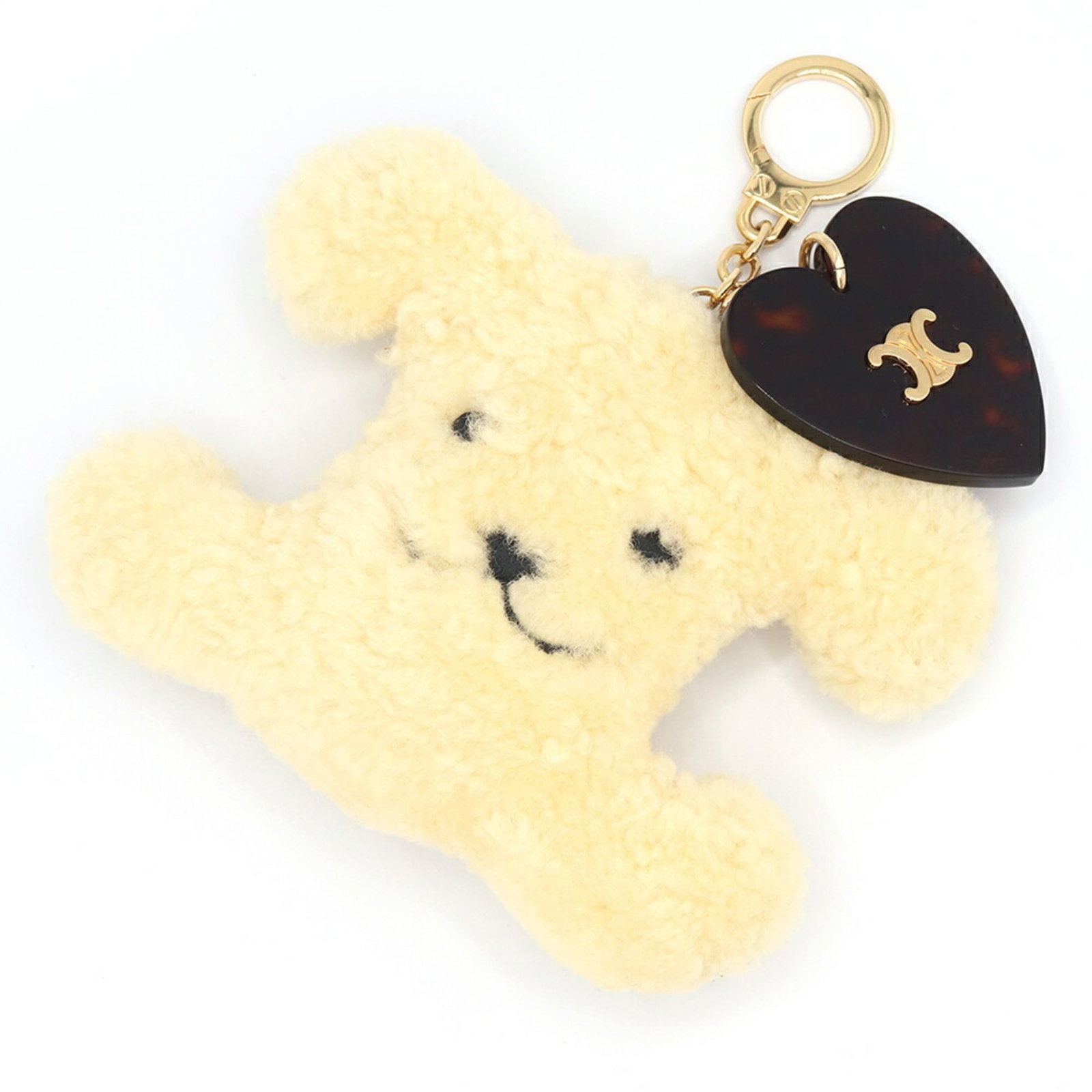 Keyring Celine: Keyring Celine A beautiful Celine keyring, perfect for adding a touch of elegance to your everyday essentials. With its classic beige and yellow color combination and adorable heart charm, this keyrin