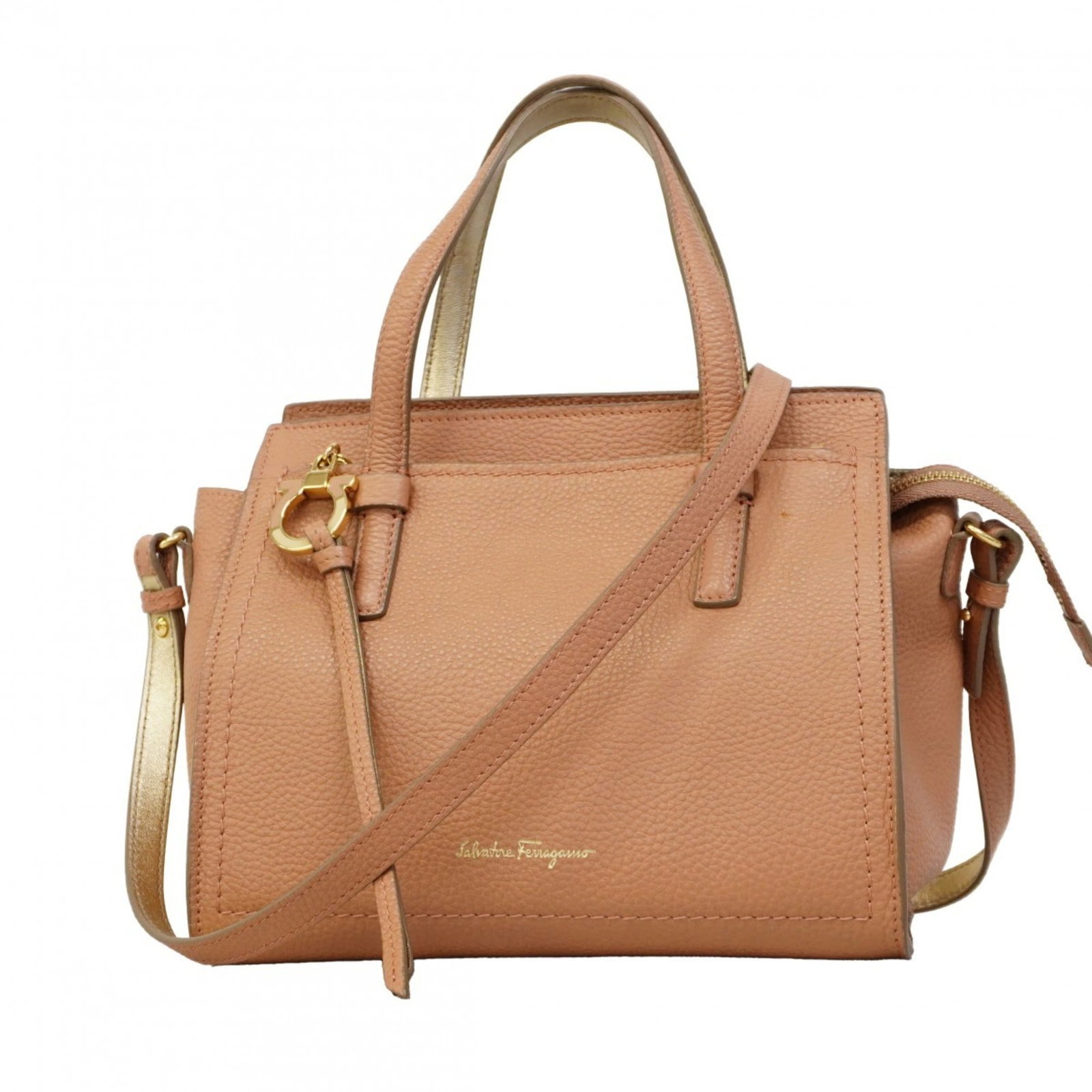 Salvatore Ferragamo Leather Handbag: Salvatore Ferragamo Leather Handbag A stunning Salvatore Ferragamo leather handbag in soft pink hues, adorned with elegant gold hardware, adds a touch of sophisticated glamour to any outfit. With its