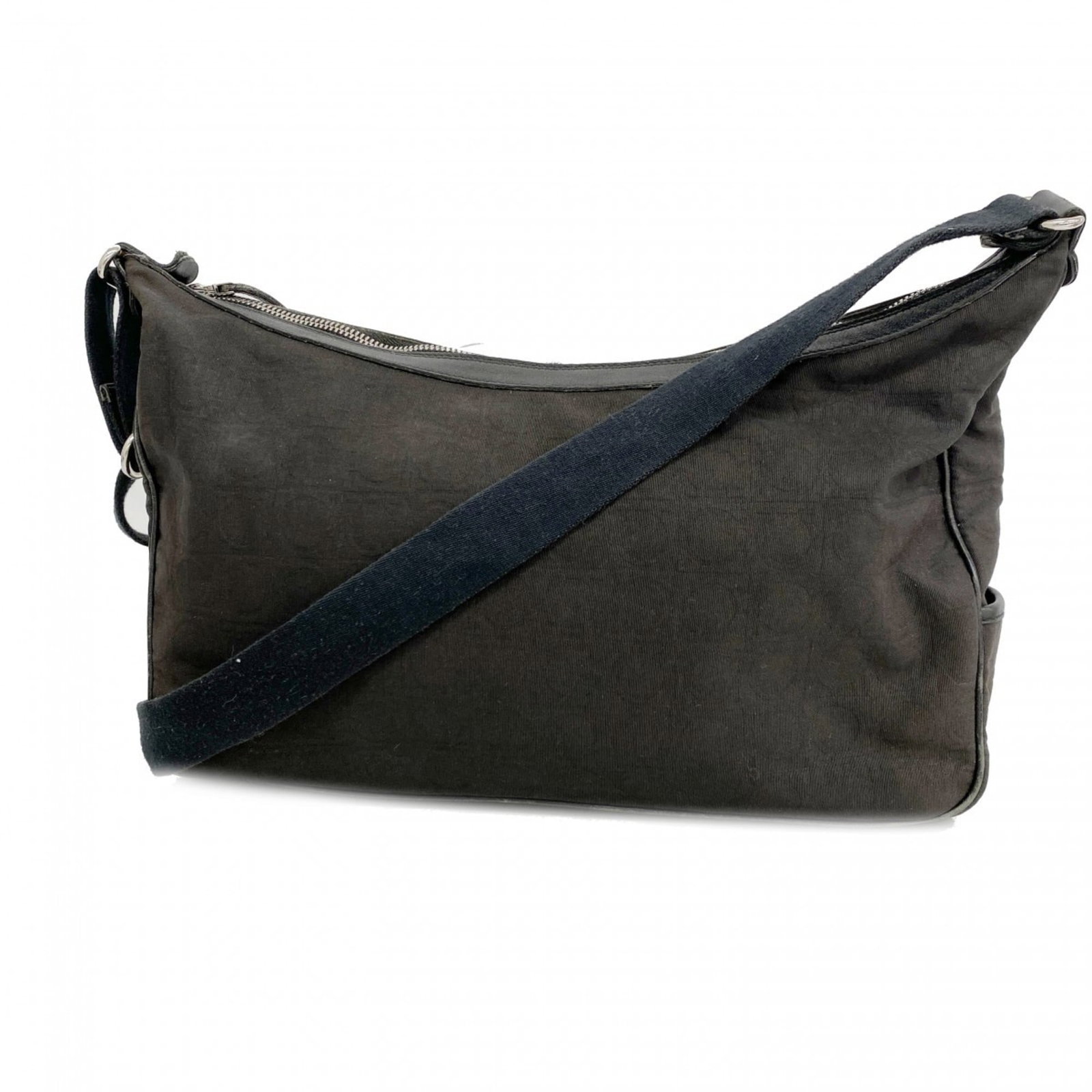 Salvatore Ferragamo Canvas Shoulder Bag: Salvatore Ferragamo Canvas Shoulder Bag A sleek and sophisticated Salvatore Ferragamo canvas shoulder bag, this black beauty boasts classic Italian style with a modern twist. With its sturdy silver