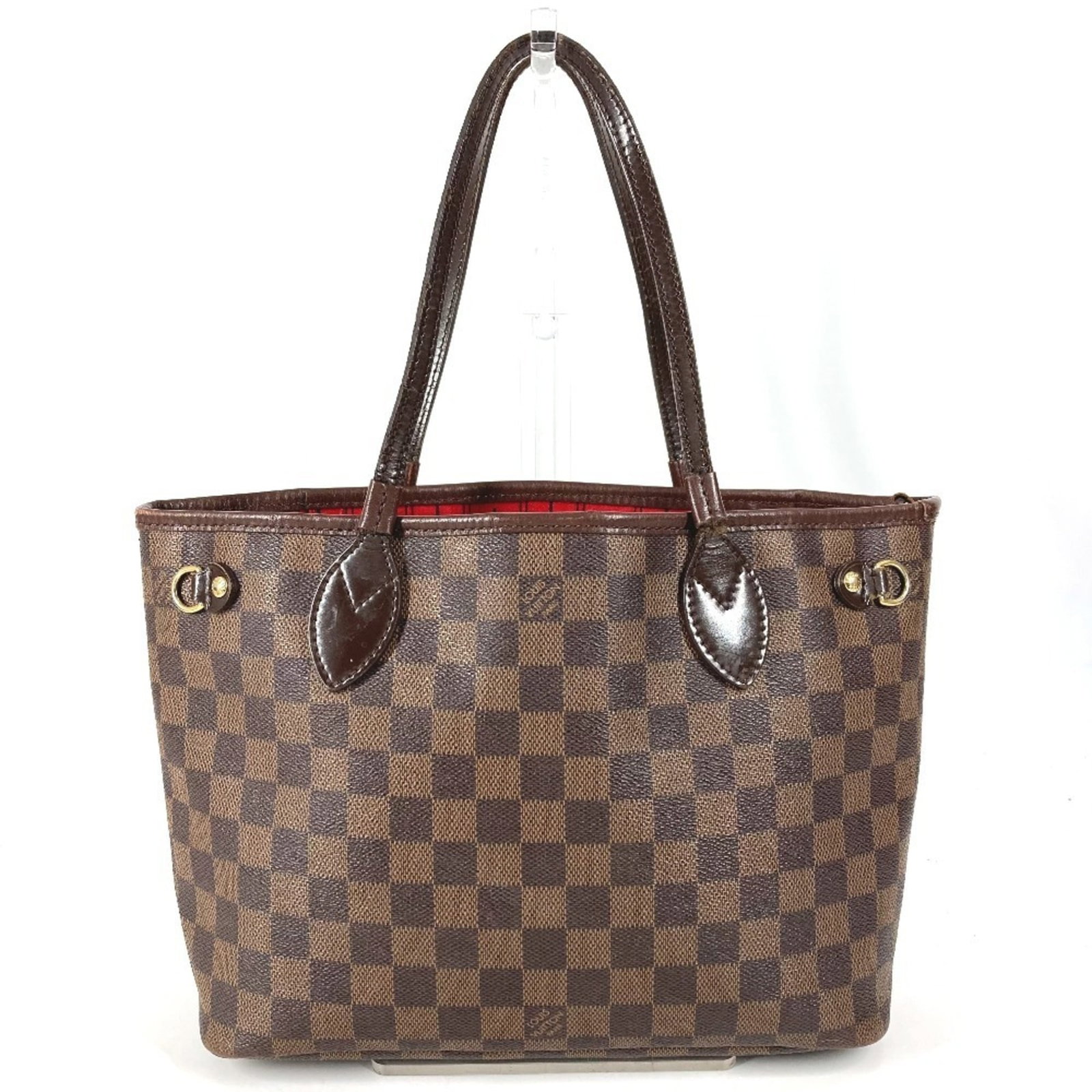 Louis Vuitton Damier Canvas Tote Bag: Louis Vuitton Damier Canvas Tote Bag A timeless and iconic accessory for the modern woman, this Louis Vuitton Damier Canvas Tote Bag boasts the classic signature of the French fashion house. With its