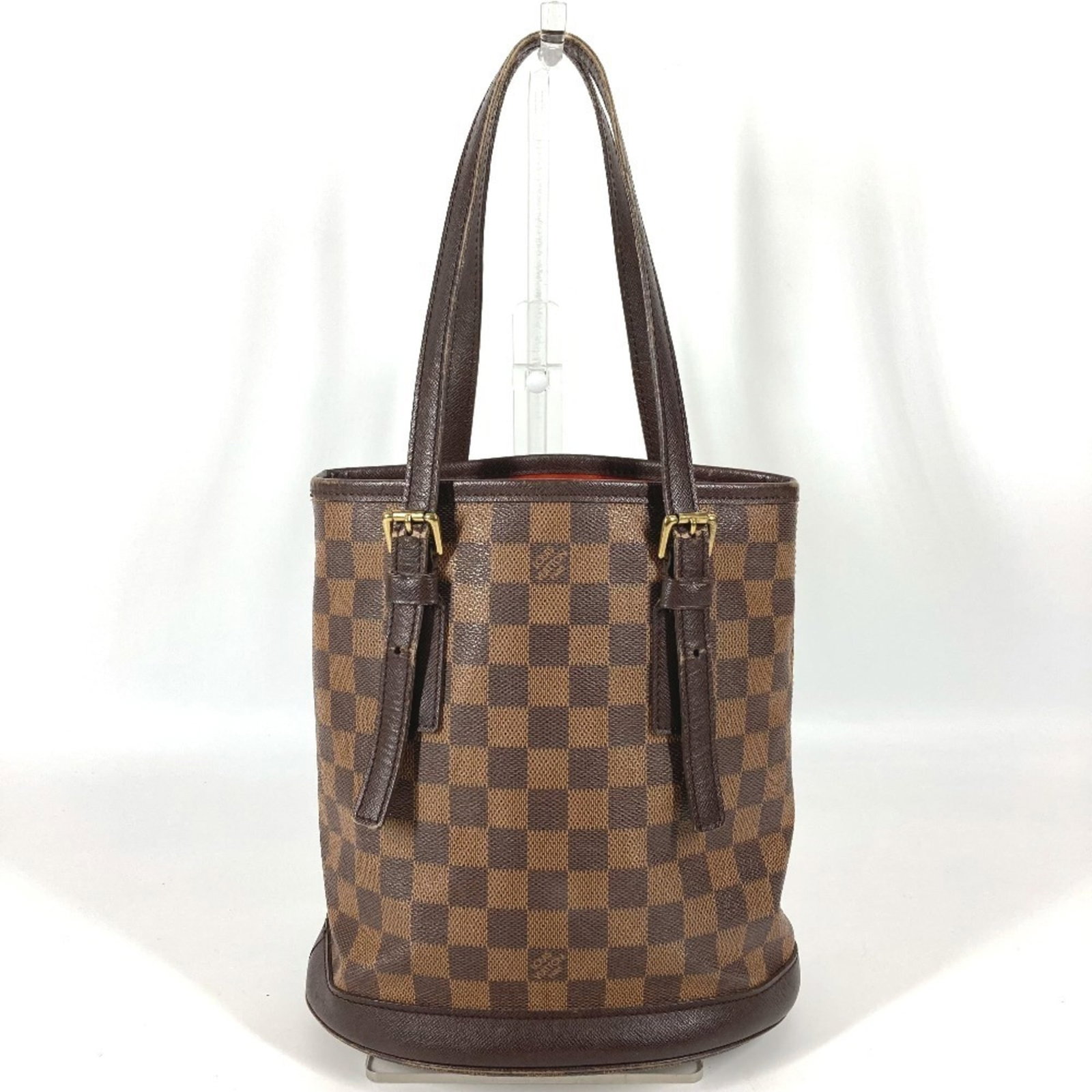 Damier Canvas Louis Vuitton Tote Bag: Damier Canvas Louis Vuitton Tote Bag A timeless and stylish accessory, this pre-owned Damier Canvas Louis Vuitton tote bag boasts the iconic brand's signature brown Ebene color and classic damier patt