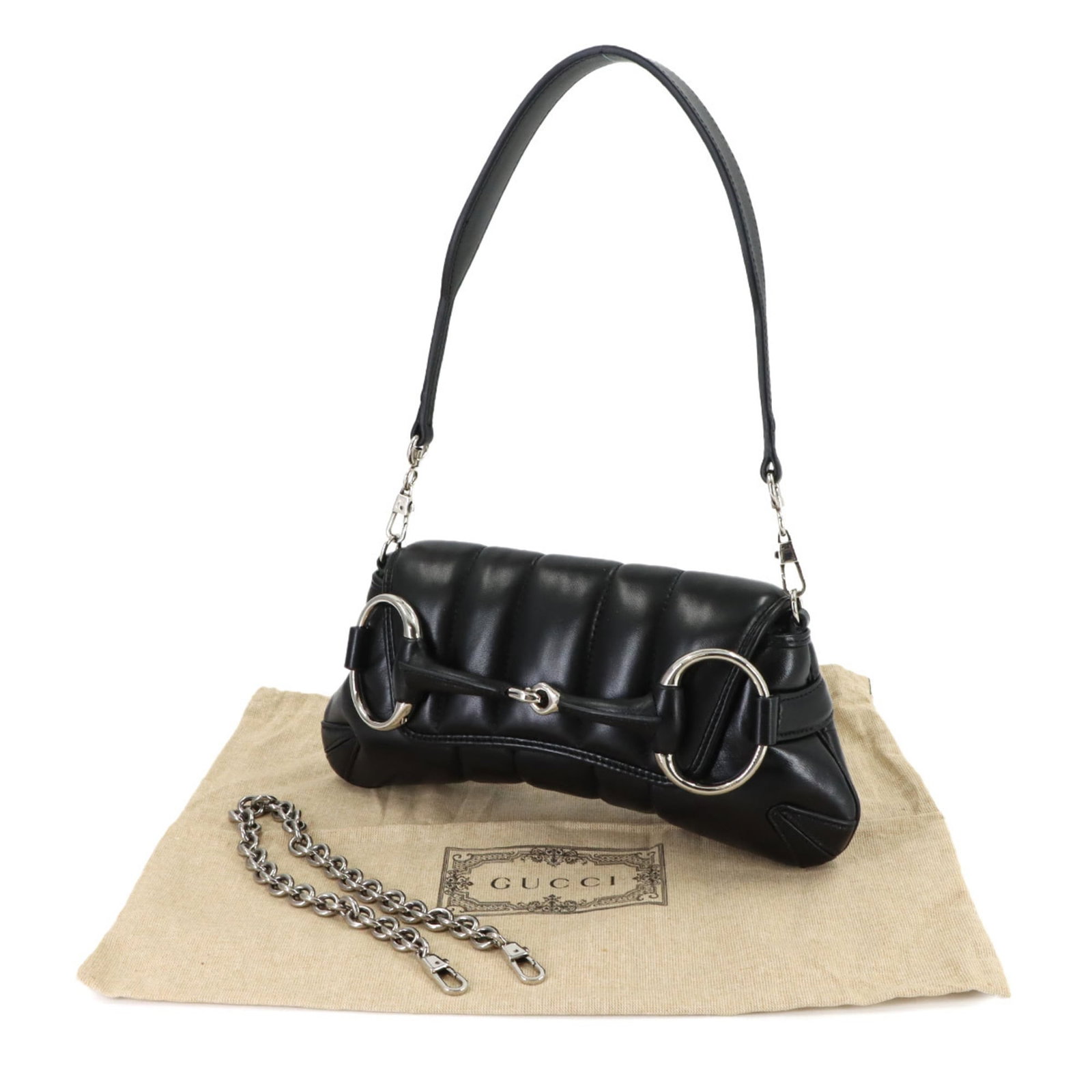 Gucci Leather Shoulder Bag: Gucci Leather Shoulder Bag Elevate your style with the iconic Gucci Leather Shoulder Bag, crafted from premium black leather that exudes sophistication and elegance. This timeless design boasts a slee