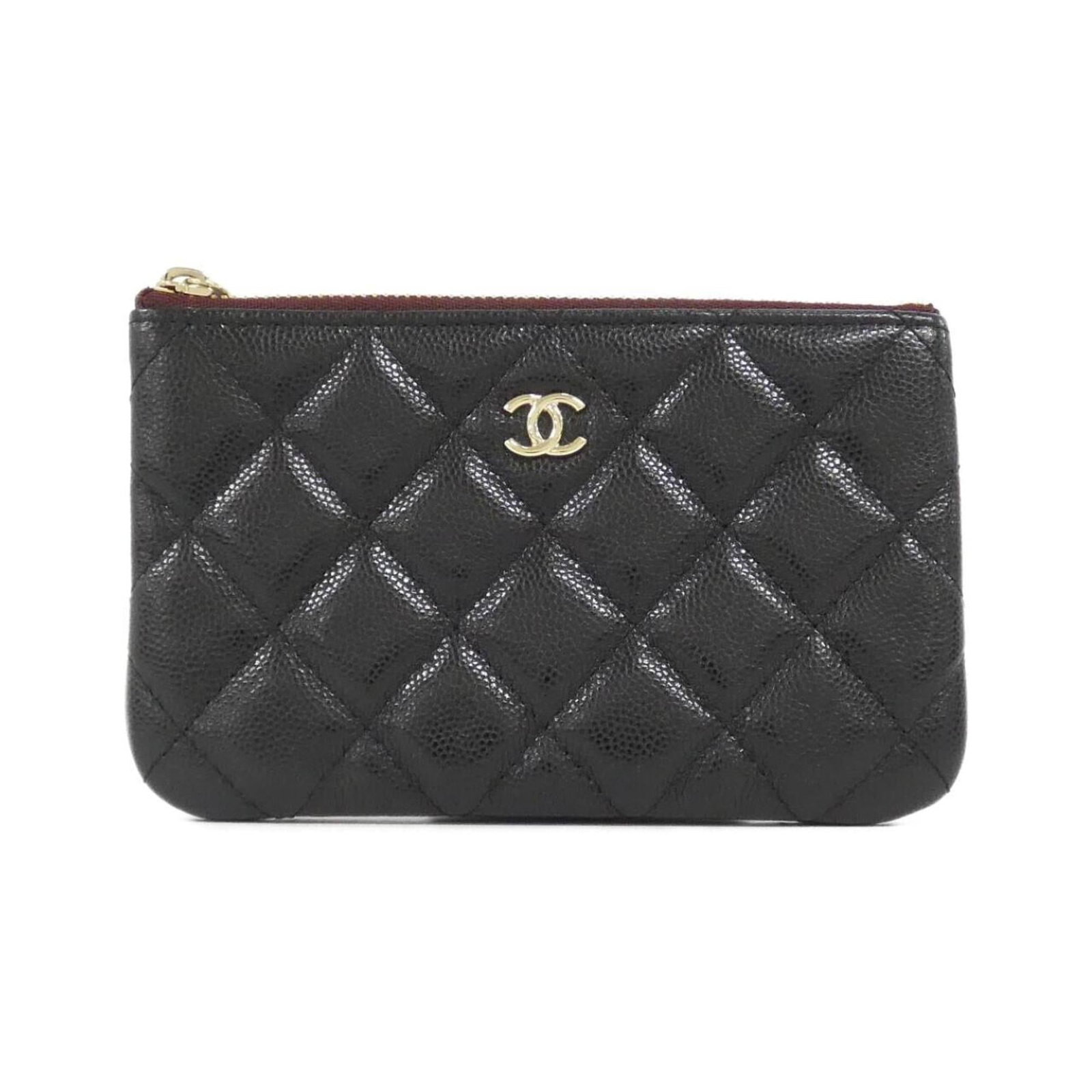 Pouch Grained Calfskin - Chanel Handbag: Pouch Grained Calfskin - Chanel Handbag A sleek and sophisticated Chanel handbag, this pouch-grained calfskin bag boasts a timeless black and Bordeaux color combination that exudes classic elegance. W