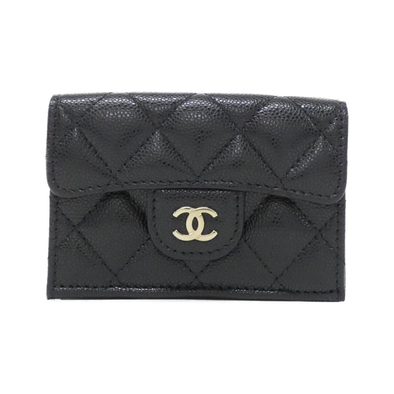 Chanel Tri-Fold Calfskin Wallet: Chanel Tri-Fold Calfskin Wallet A timeless piece from the iconic Chanel brand, this tri-fold calfskin wallet boasts sleek black leather and classic design elements that exude sophistication. With its