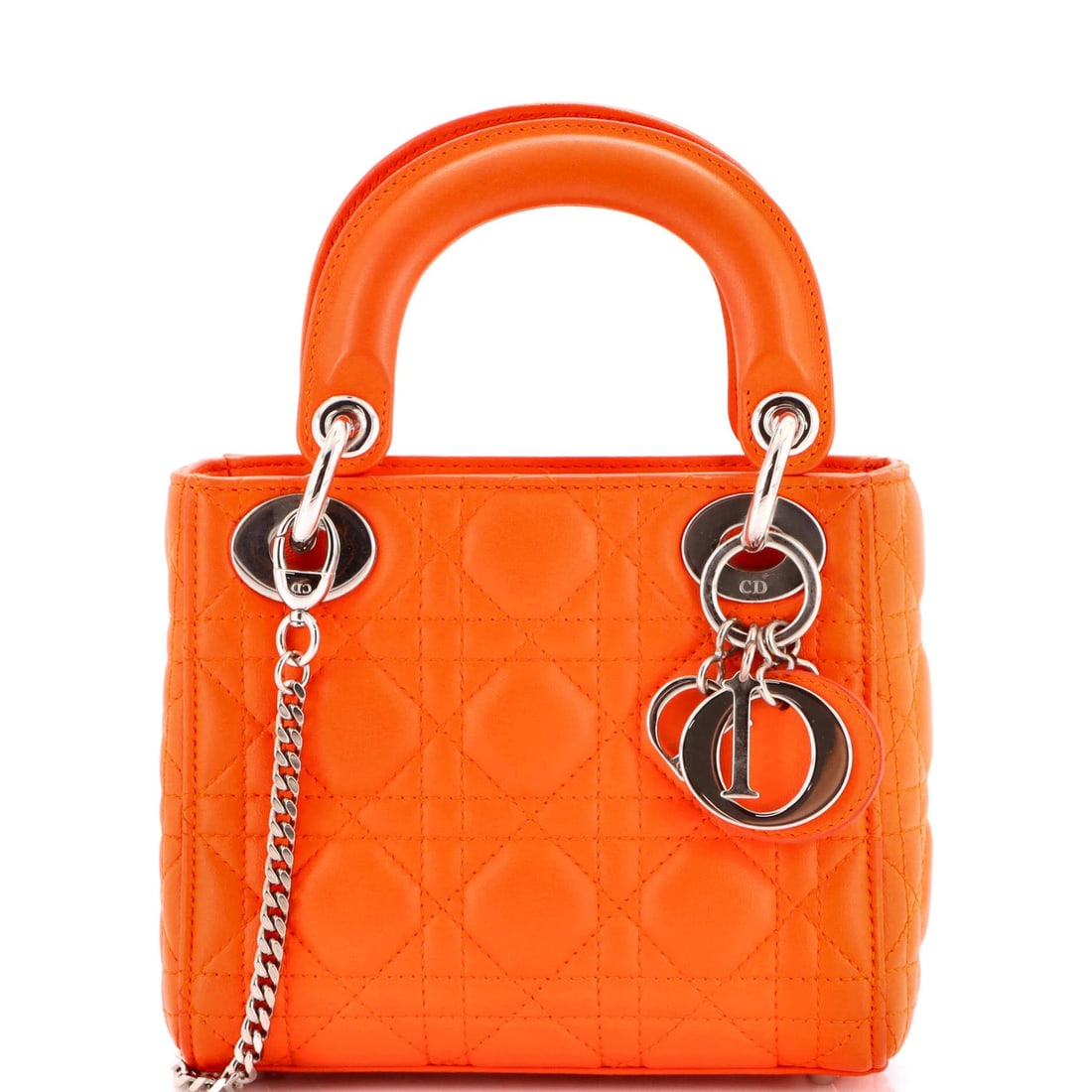 Christian Dior Lady Dior Chain Bag in Cannage Quilt Lambskin Mini: Christian Dior Lady Dior Chain Bag in Cannage Quilt Lambskin Mini The Christian Dior Lady Dior Chain Bag in Cannage Quilt Lambskin Mini is a stunning, miniaturized version of the iconic design, boasti