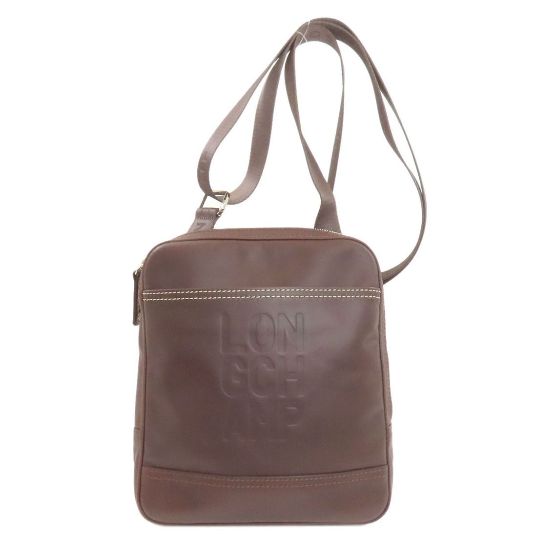 Longchamp Logo Leather Shoulder Bag: Longchamp Logo Leather Shoulder Bag Elevate your everyday style with the iconic Longchamp Logo Leather Shoulder Bag, crafted from rich brown leather that develops a beautiful patina over time. The