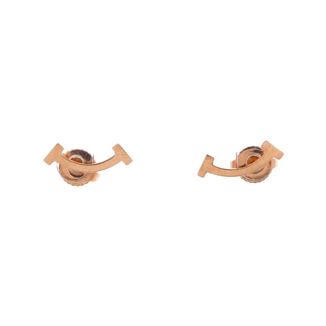Tiffany & Co. T Smile Stud Earrings in 18K Rose Gold: Tiffany & Co. T Smile Stud Earrings in 18K Rose Gold Elevate your style with these exquisite Tiffany & Co. T Smile Stud Earrings in 18K Rose Gold. Crafted from high-quality 18K rose gold, these unders
