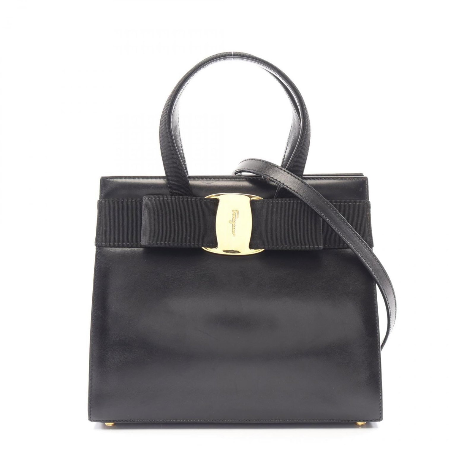 Salvatore Ferragamo Leather Handbag: Salvatore Ferragamo Leather Handbag A timeless and sophisticated Salvatore Ferragamo leather handbag in sleek black, boasting classic design elements that exude elegance and refinement. With its