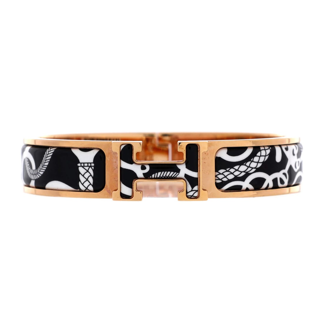 Narrow Hermes Clic H Bracelet Printed Enamel: Narrow Hermes Clic H Bracelet Printed Enamel A sleek and sophisticated Hermes Clic H Bracelet, this narrow print enamel bracelet boasts a chic black exterior with subtle details that add to its allure
