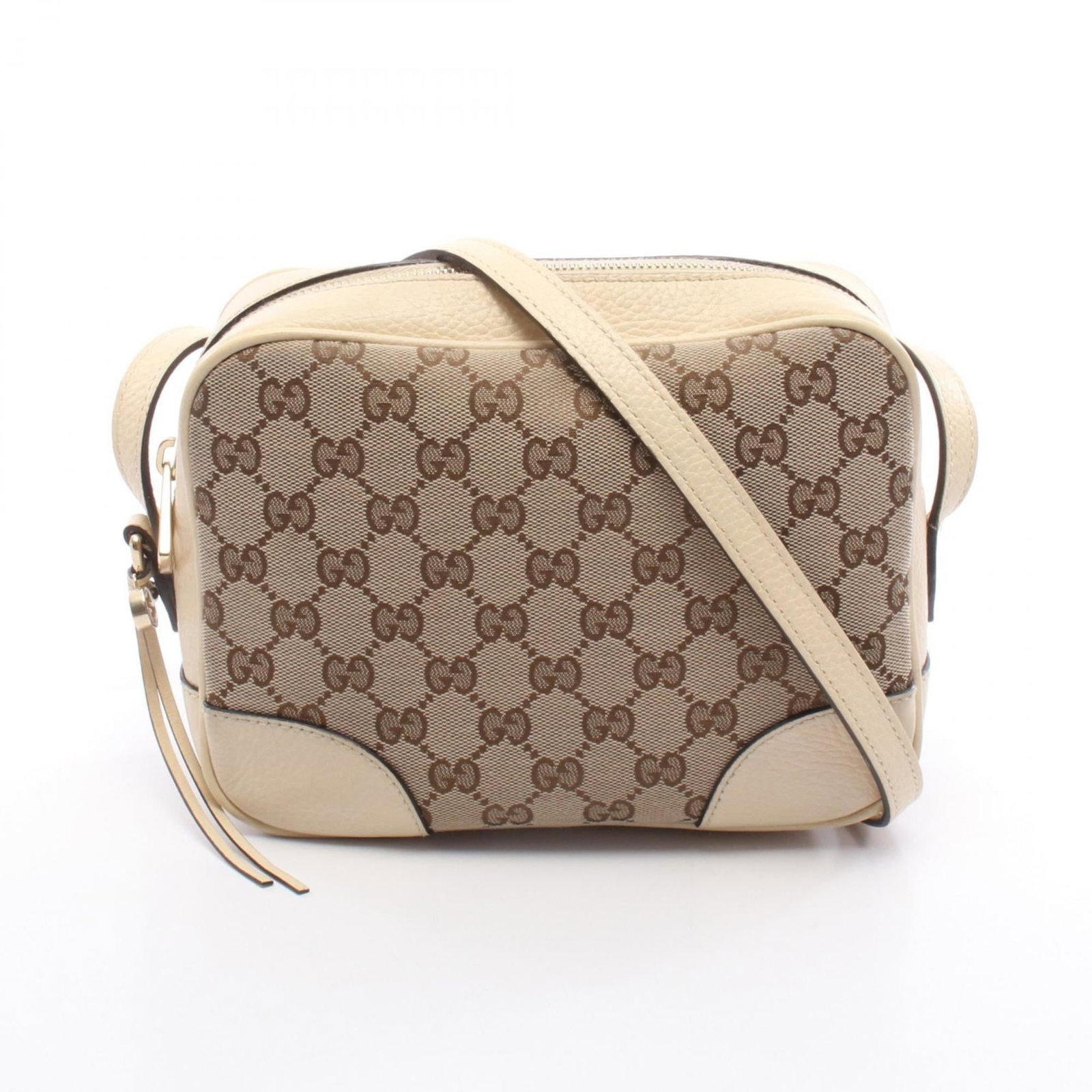 Leather - Gucci Handbag - Shoulder Bag Gg Canvas: Leather - Gucci Handbag - Shoulder Bag Gg Canvas A pre-owned Gucci shoulder bag in beige, featuring high-quality Gg Canvas and genuine leather accents, adds a touch of luxury to any outfit. With its c