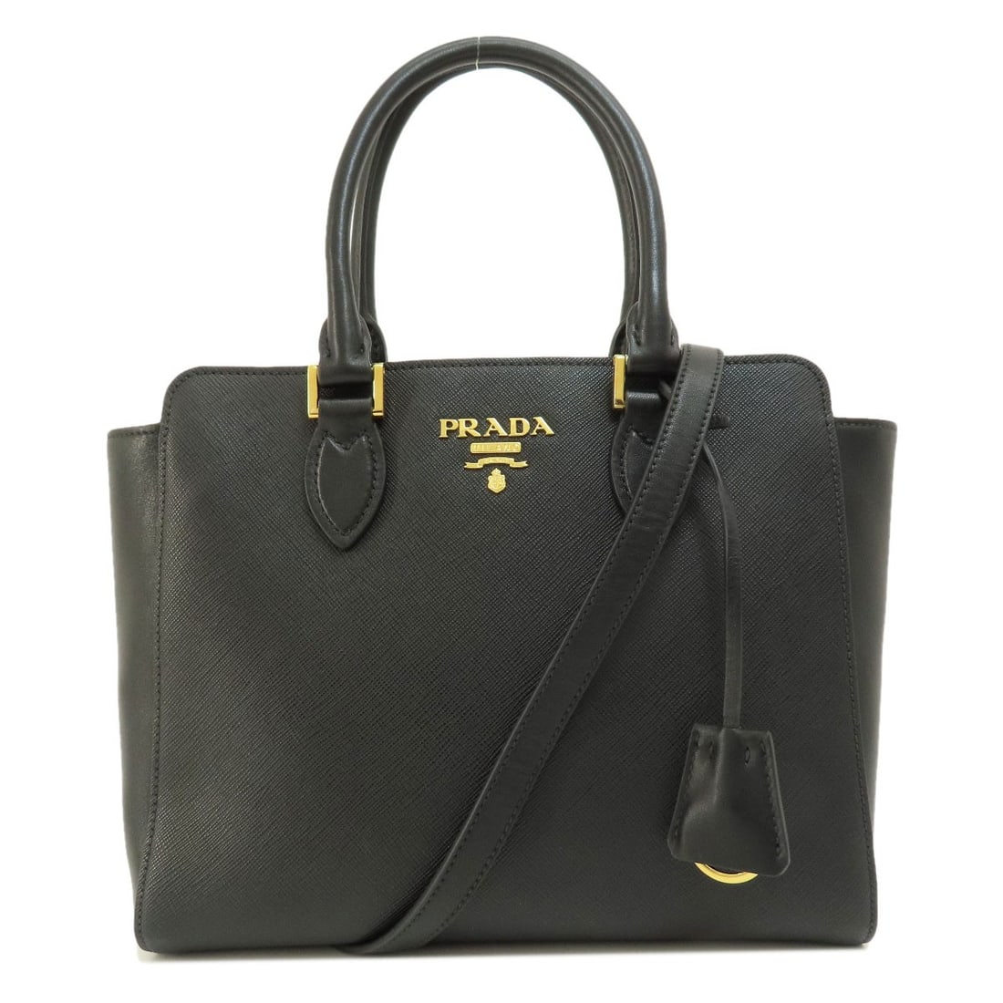 PVC PRADA 1BA113 2WAY Handbag Leather: PVC PRADA 1BA113 2WAY Handbag Leather A sleek and sophisticated black leather handbag from PRADA, crafted with premium quality materials and designed for everyday elegance. This 2-way design allows fo