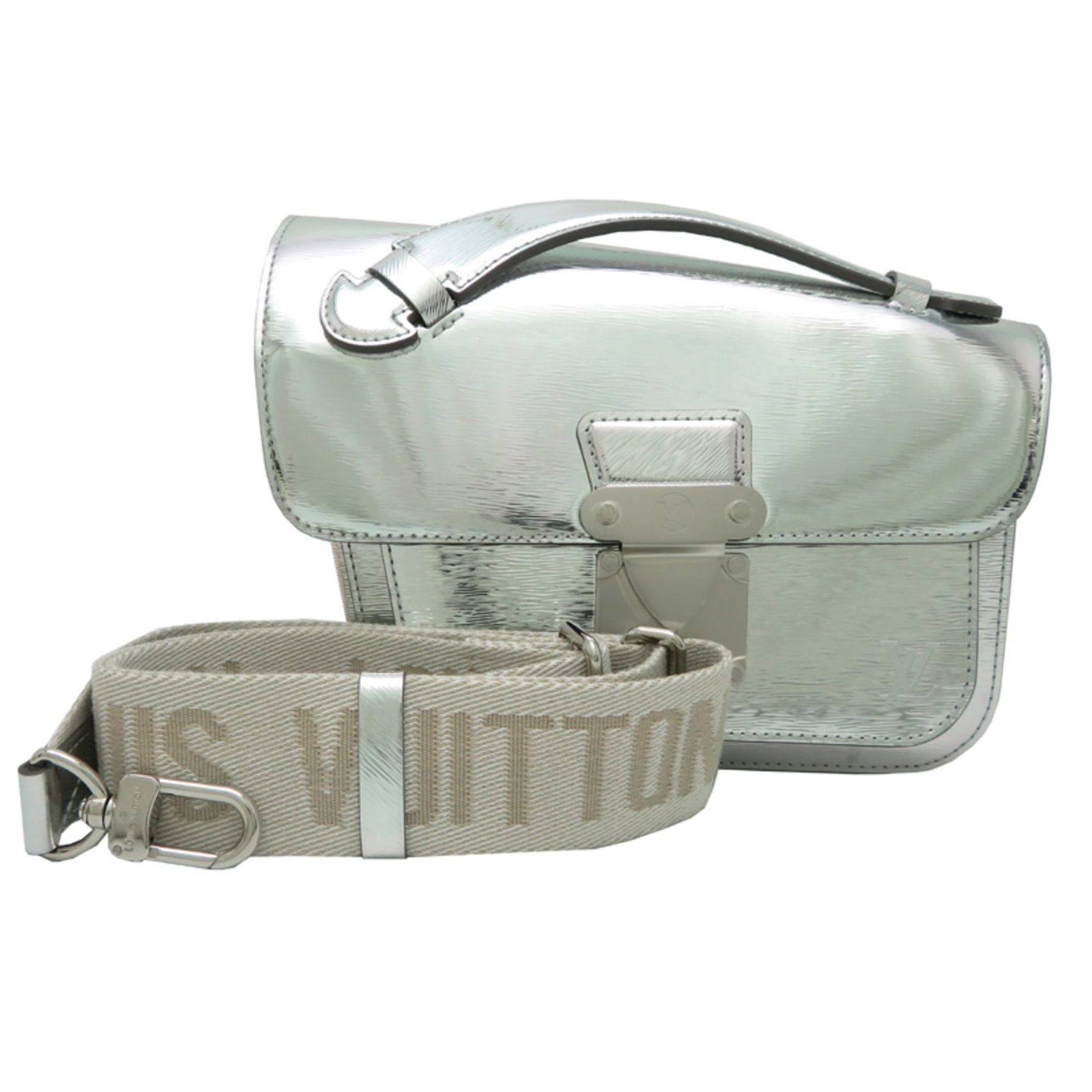 Louis Vuitton Metal Handbag: Louis Vuitton Metal Handbag A sleek and sophisticated silver Louis Vuitton metal handbag, perfect for the modern gentleman who values timeless style and durability. With its classic design and sturdy