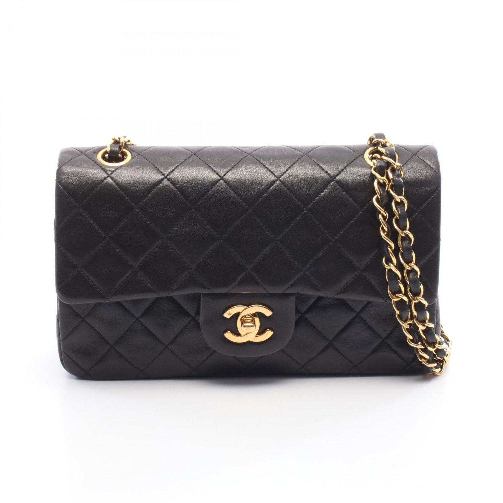 Chanel Leather Shoulder Bag: Chanel Leather Shoulder Bag A timeless Chanel classic, this lambskin shoulder bag exudes elegance with its sleek black leather exterior and refined details. With its compact size and sturdy design, it