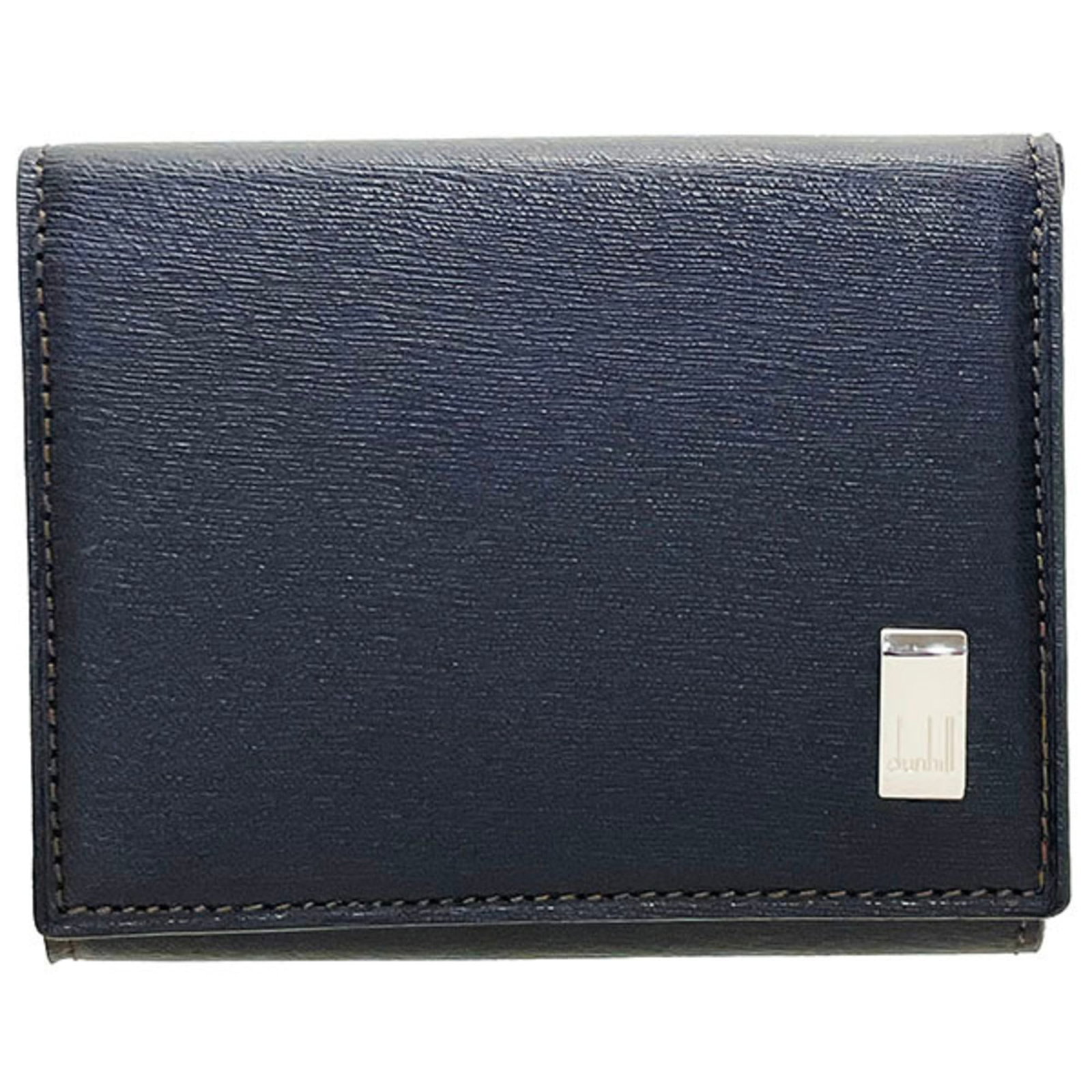 Dunhill Leather Coin Purse: Dunhill Leather Coin Purse A classic Dunhill leather coin purse, crafted from rich dark brown leather, adds a touch of sophistication to any wallet or pocket. With its compact size and sturdy construc