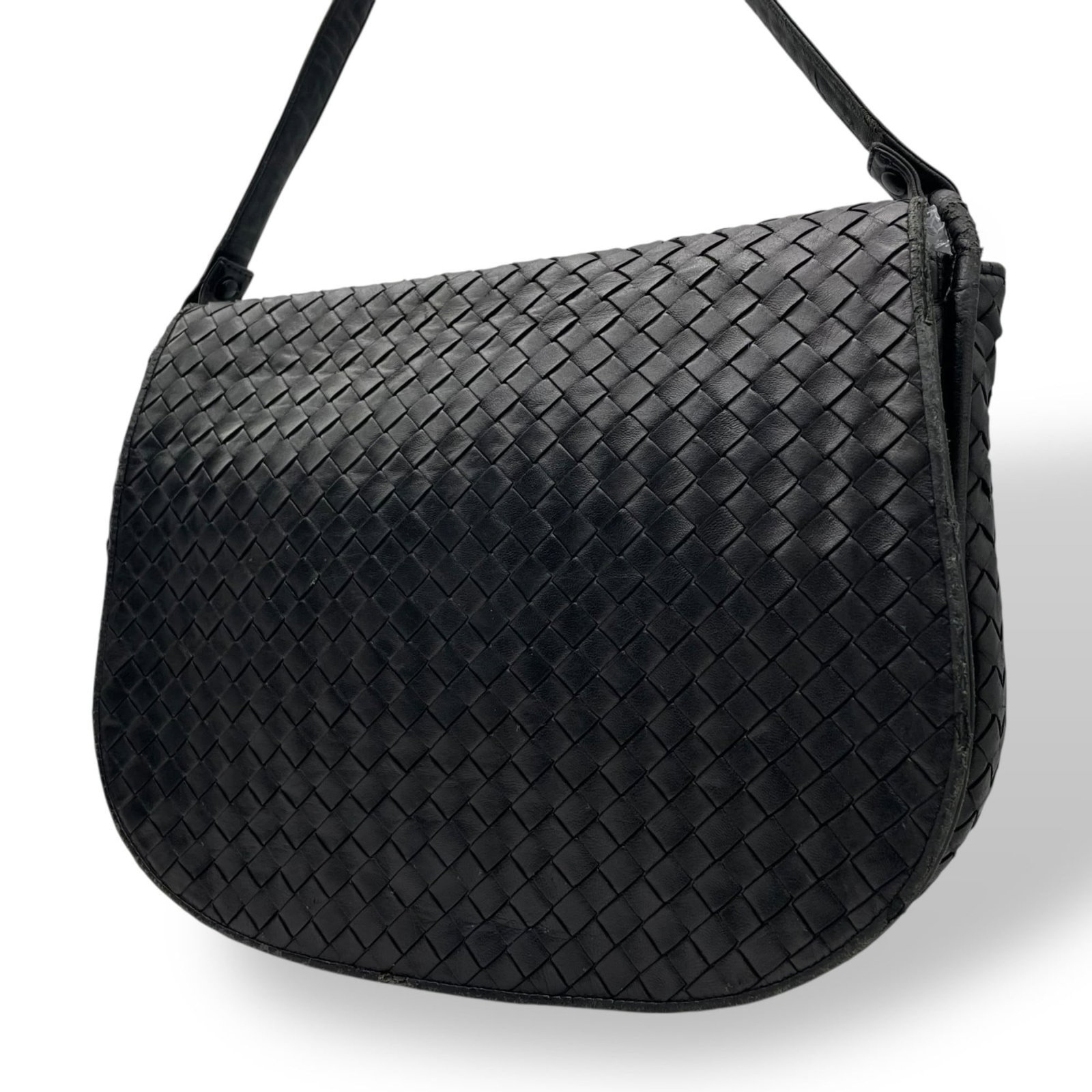 Bottega Veneta Intrecciato Shoulder Bag: Bottega Veneta Intrecciato Shoulder Bag Experience the timeless elegance of Bottega Veneta with this exquisite Intrecciato shoulder bag, crafted from rich black leather and boasting the iconic woven i