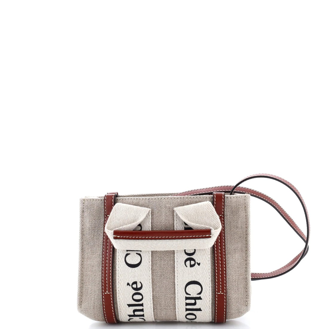 Mini Chloe Woody Convertible Tote Canvas with Leather: Mini Chloe Woody Convertible Tote Canvas with Leather The Chloe Woody Convertible Tote is a stylish and versatile accessory that combines the best of both worlds - a spacious canvas interior and sleek