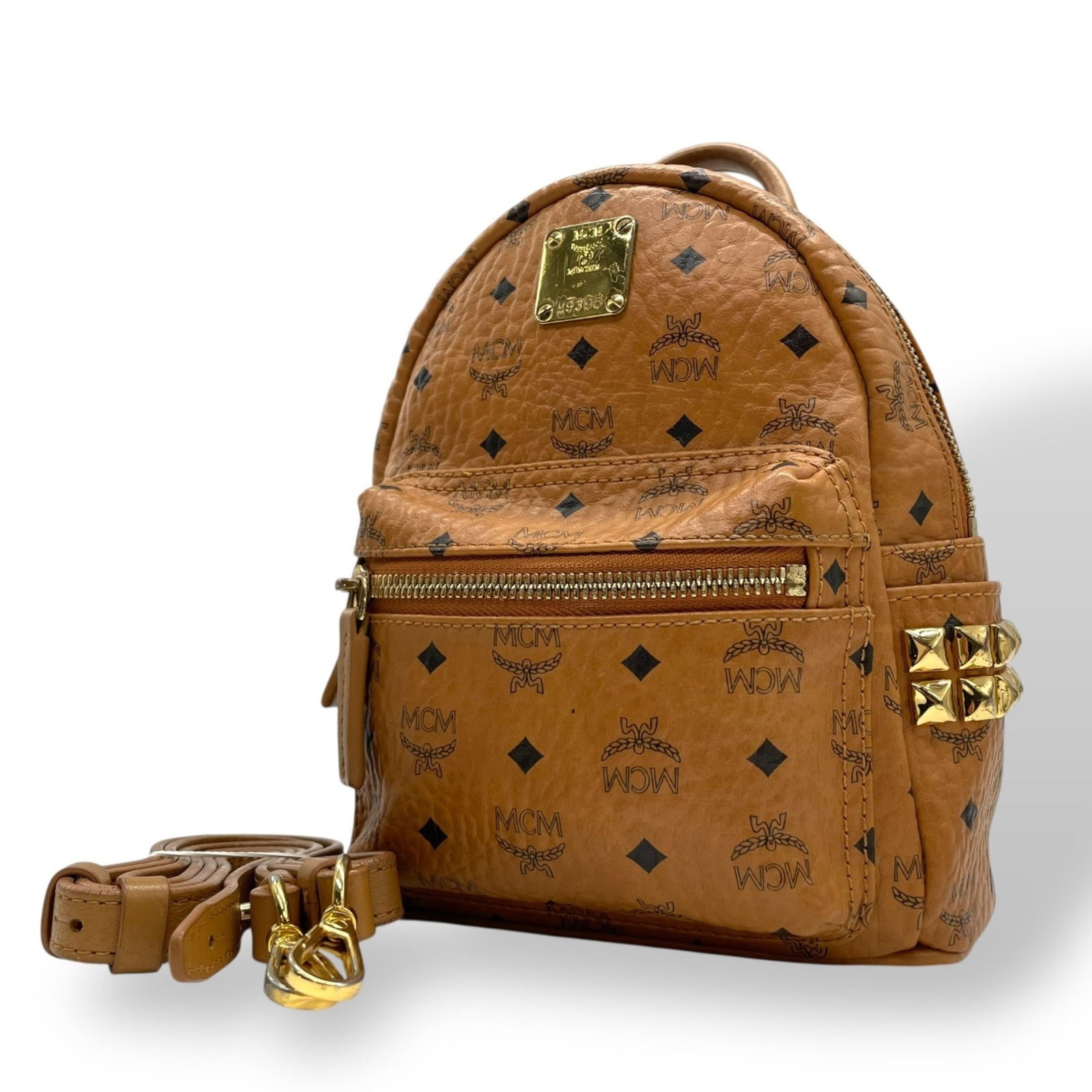 Leather Mcm Sling Bag: Leather Mcm Sling Bag A stylish and timeless leather sling bag from the iconic Mcm brand, perfect for adding a touch of sophistication to your everyday essentials. With its rich brown color and classi