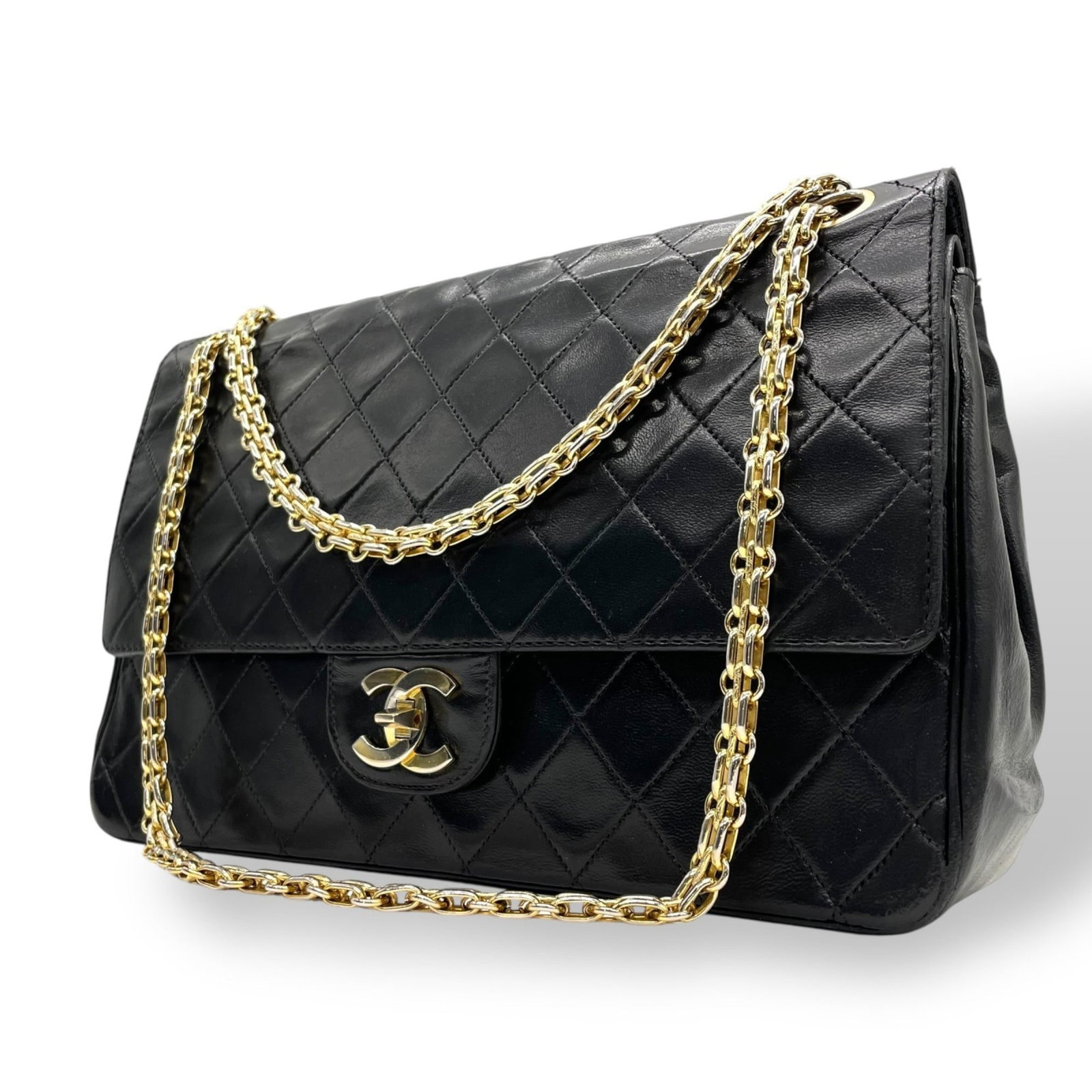 Chanel Leather Shoulder Bag: Chanel Leather Shoulder Bag A timeless Chanel leather shoulder bag in sleek black, boasting classic quilted design and premium quality leather that develops a beautiful patina with age. With its spaci