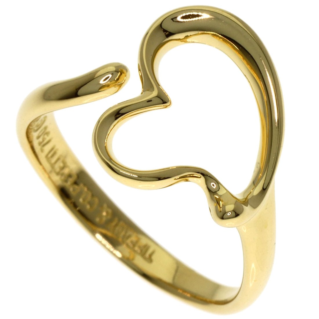 Tiffany & Co. K18 Yellow Gold Open Heart Ring: Tiffany & Co. K18 Yellow Gold Open Heart Ring Experience the timeless elegance of Tiffany & Co.'s K18 Yellow Gold Open Heart Ring, crafted with exceptional quality and attention to detail. This