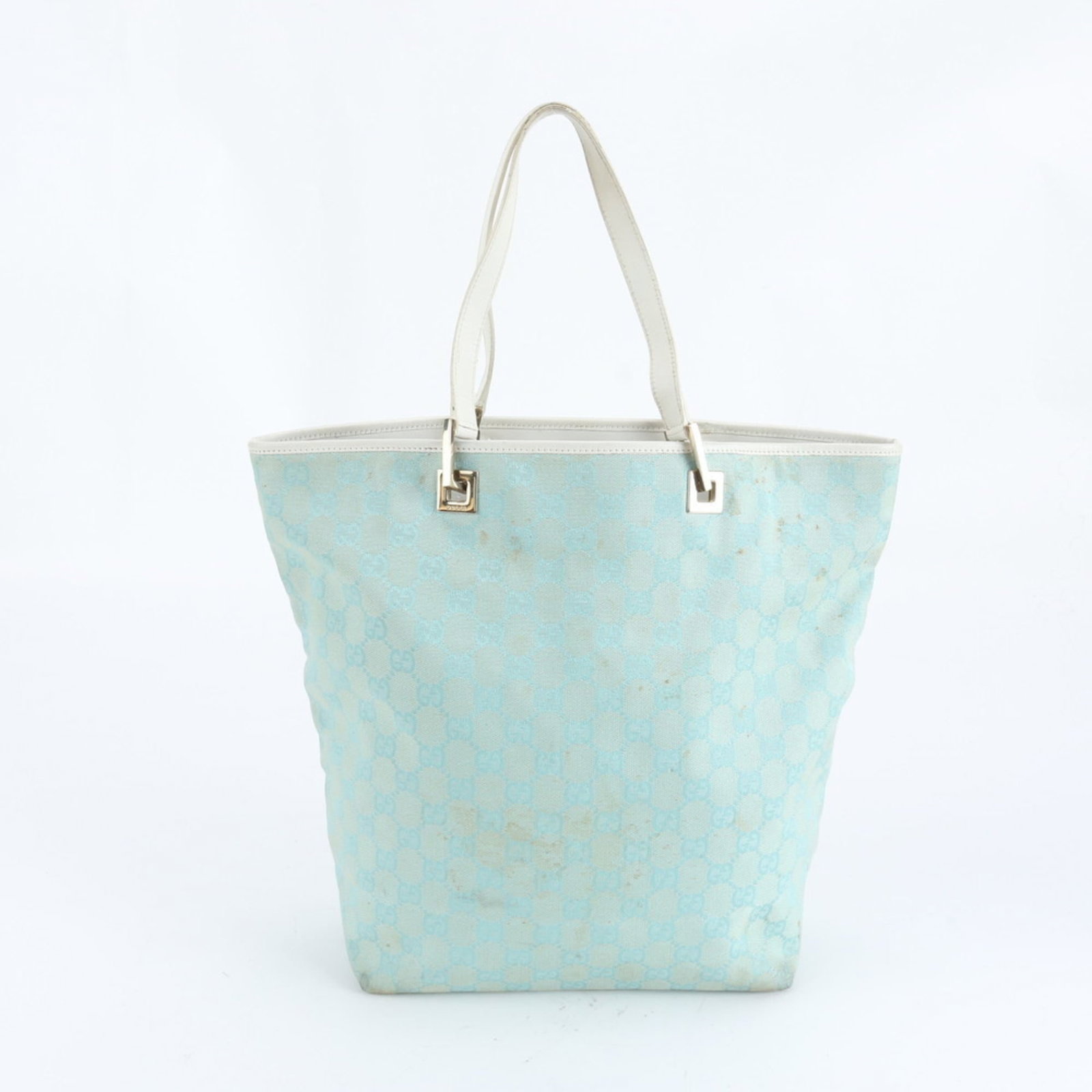 Canvas - Gucci Handbag - Shoulder Bag - Tote Bag Leather: Canvas - Gucci Handbag - Shoulder Bag - Tote Bag Leather A stunning Gucci shoulder bag, crafted from high-quality leather and canvas, boasts a timeless light blue hue that adds a touch of elegance to