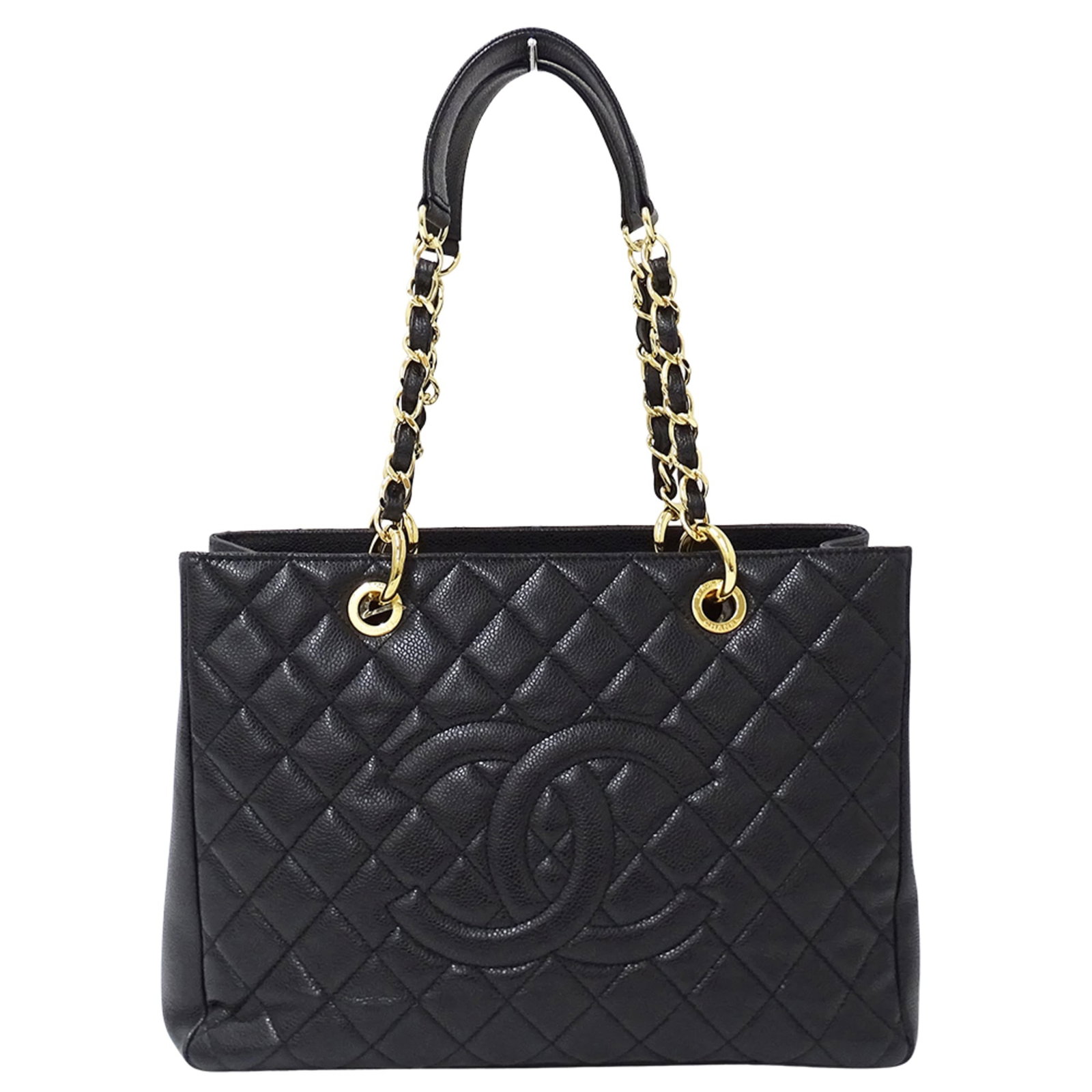 Chanel Tote Bag in Grained Calfskin: Chanel Tote Bag in Grained Calfskin A sleek and timeless Chanel tote bag in black grained calfskin, perfect for adding sophistication to any outfit. With its classic design and premium material, this