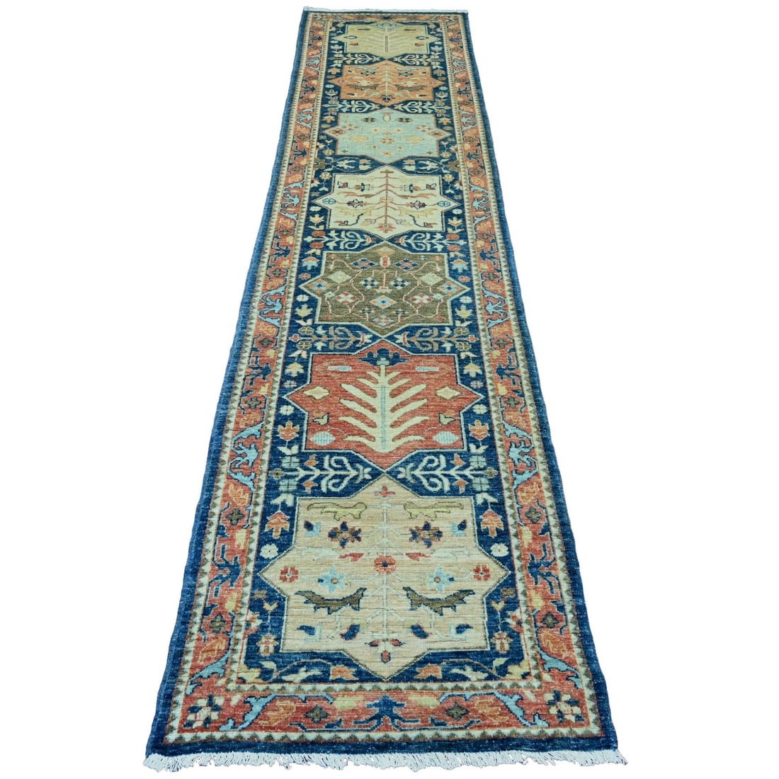 Aryana Grade Blue Hand-Knotted Wool Runner Rug (2'7"x11'9"): Aryana Grade Blue Hand-Knotted Wool Runner Rug (2'7"x11'9") Experience the rich beauty of traditional Afghan craftsmanship with this stunning Aryana Grade Blue Hand-Knotted Wool Runner Rug, expertly w