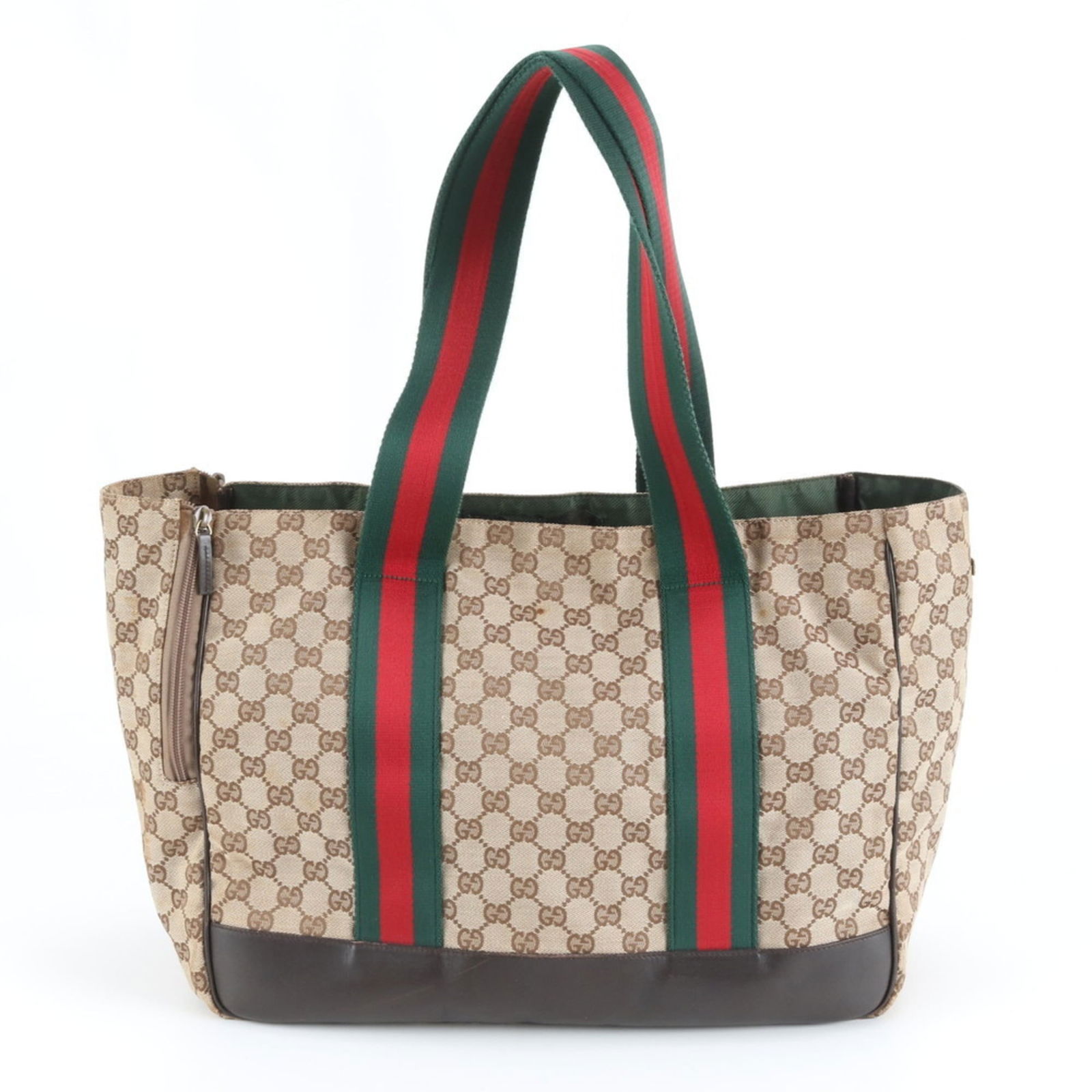 Gucci Tote Bag in Leather and Canvas: Gucci Tote Bag in Leather and Canvas A timeless Gucci tote bag in rich brown leather and canvas, perfect for adding an air of sophistication to any outfit. With its classic shoulder strap design and s