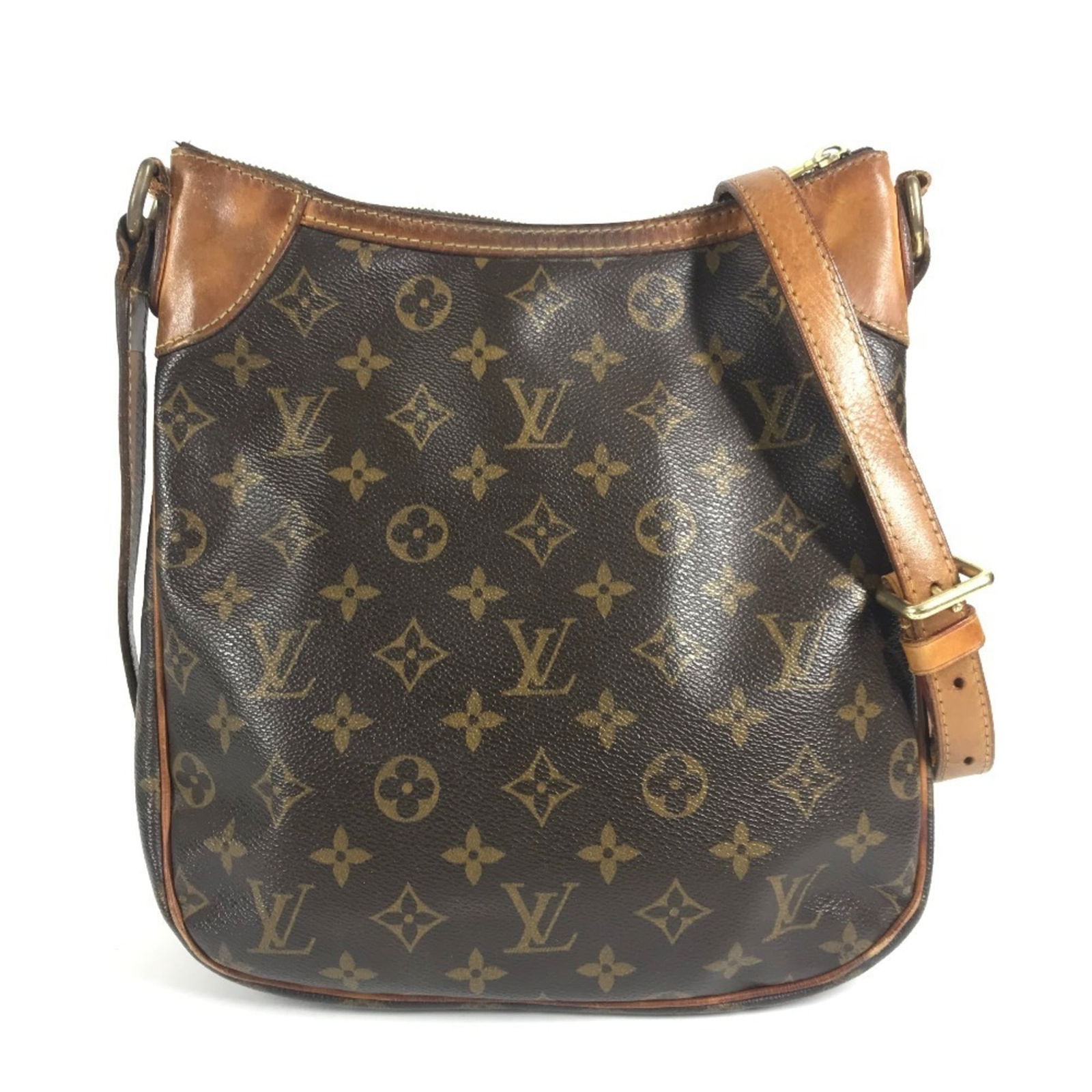 Louis Vuitton Monogram Pochette Shoulder Bag: Louis Vuitton Monogram Pochette Shoulder Bag A timeless piece from the iconic Louis Vuitton Monogram collection, this brown pochette shoulder bag boasts the signature interlocking LV monogram pattern