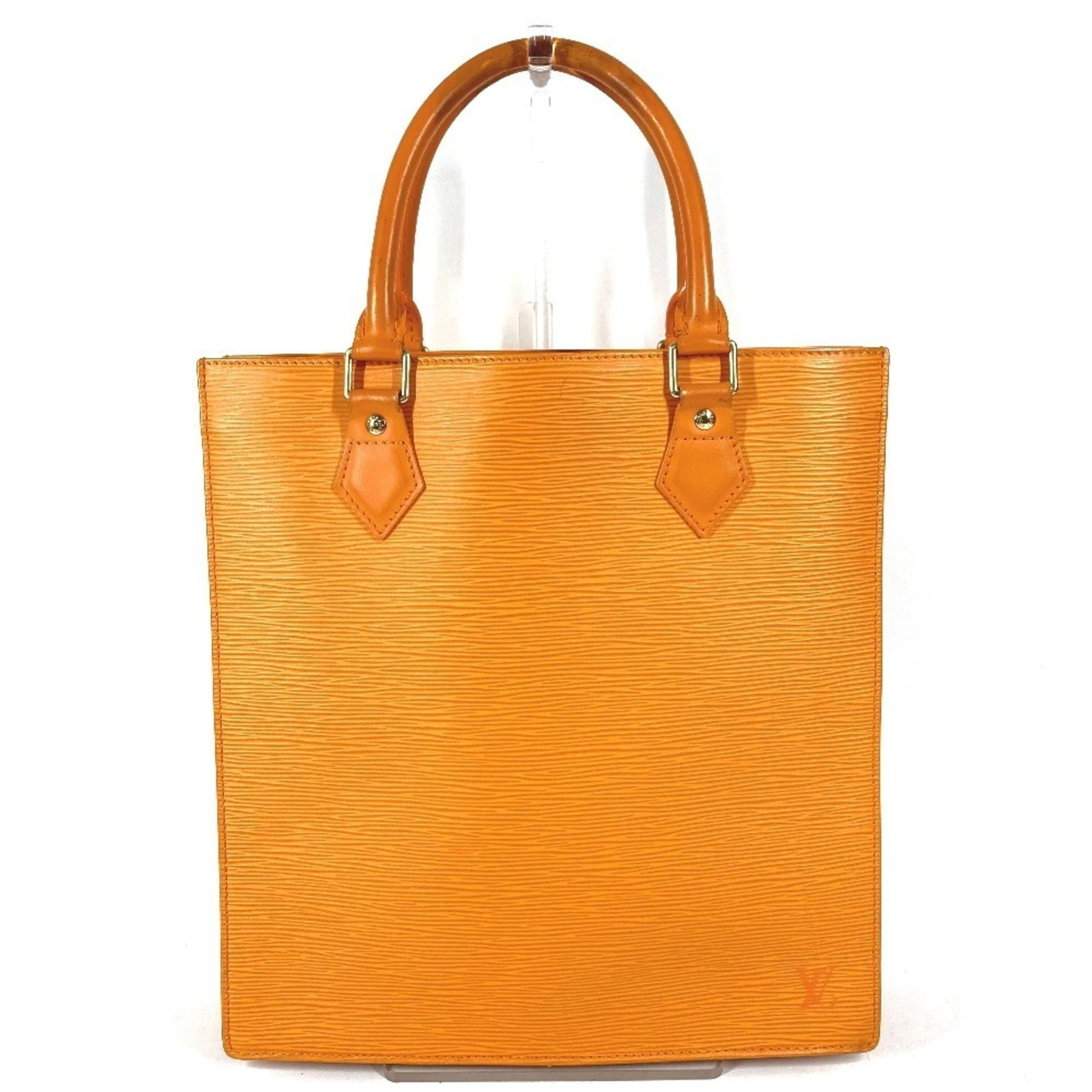 Louis Vuitton Epi Leather Tote Bag: Louis Vuitton Epi Leather Tote Bag A timeless classic, this Louis Vuitton Epi Leather Tote Bag boasts the iconic Galle orange hue and premium Epi leather construction, exuding luxury and sophisticatio