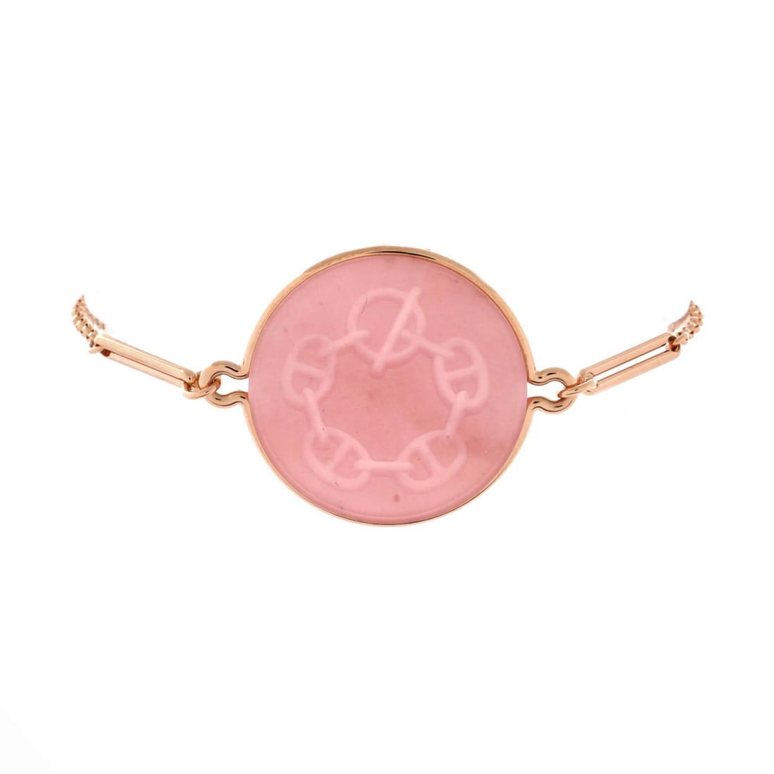 Hermes Ex Libris 18k Rose Gold Pink Chalcedony Large: Hermes Ex Libris 18k Rose Gold Pink Chalcedony Large A stunning Hermes Ex Libris 18k rose gold bracelet boasts a large pink chalcedony stone, adding a touch of elegance and sophistication to any outfi
