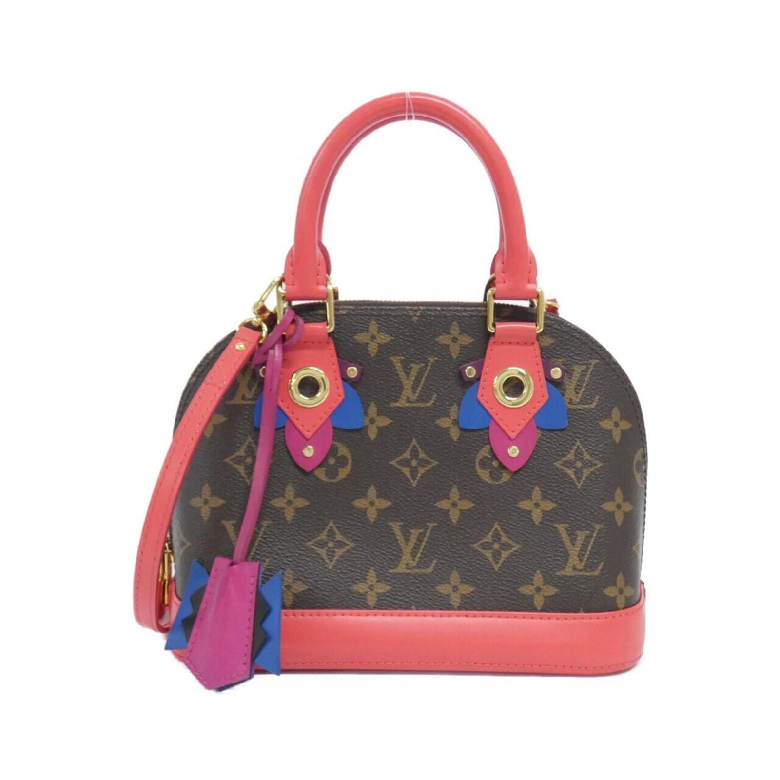 Louis Vuitton Coated Canvas Handbag: Louis Vuitton Coated Canvas Handbag Experience the timeless elegance of Louis Vuitton with this beautifully crafted, coated canvas handbag. With its rich maroon hue and gold hardware, this classic des