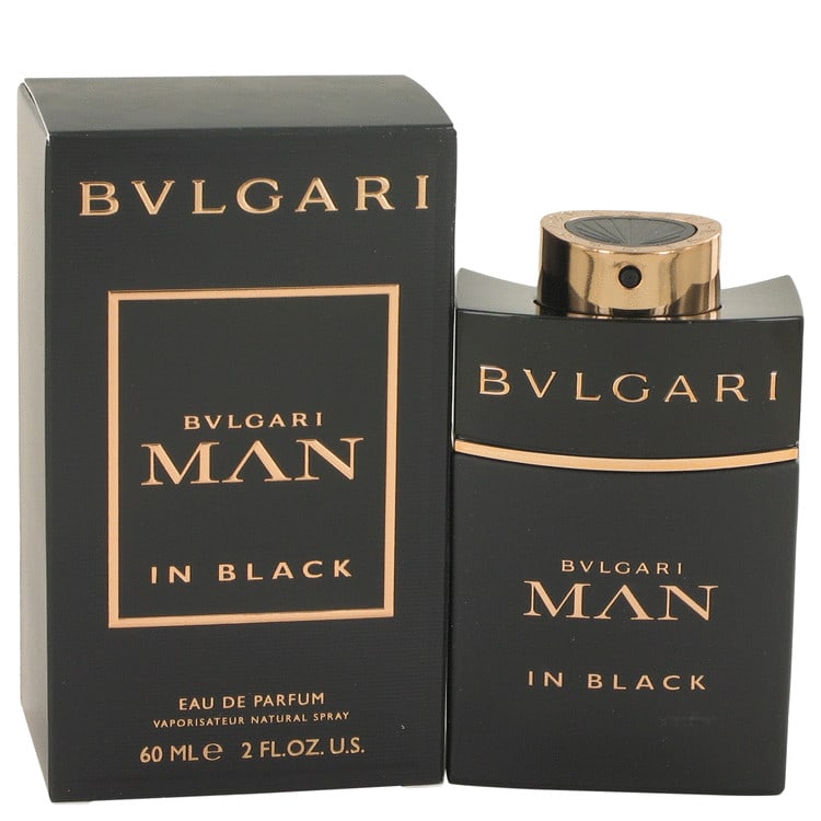 Bvlgari Man in Black Eau de Parfum Spray: Bvlgari Man in Black Eau de Parfum Spray Experience the sophisticated elegance of Bvlgari Man in Black, a timeless cologne that exudes confidence and refinement. With its rich, woody scent, this 2 oz
