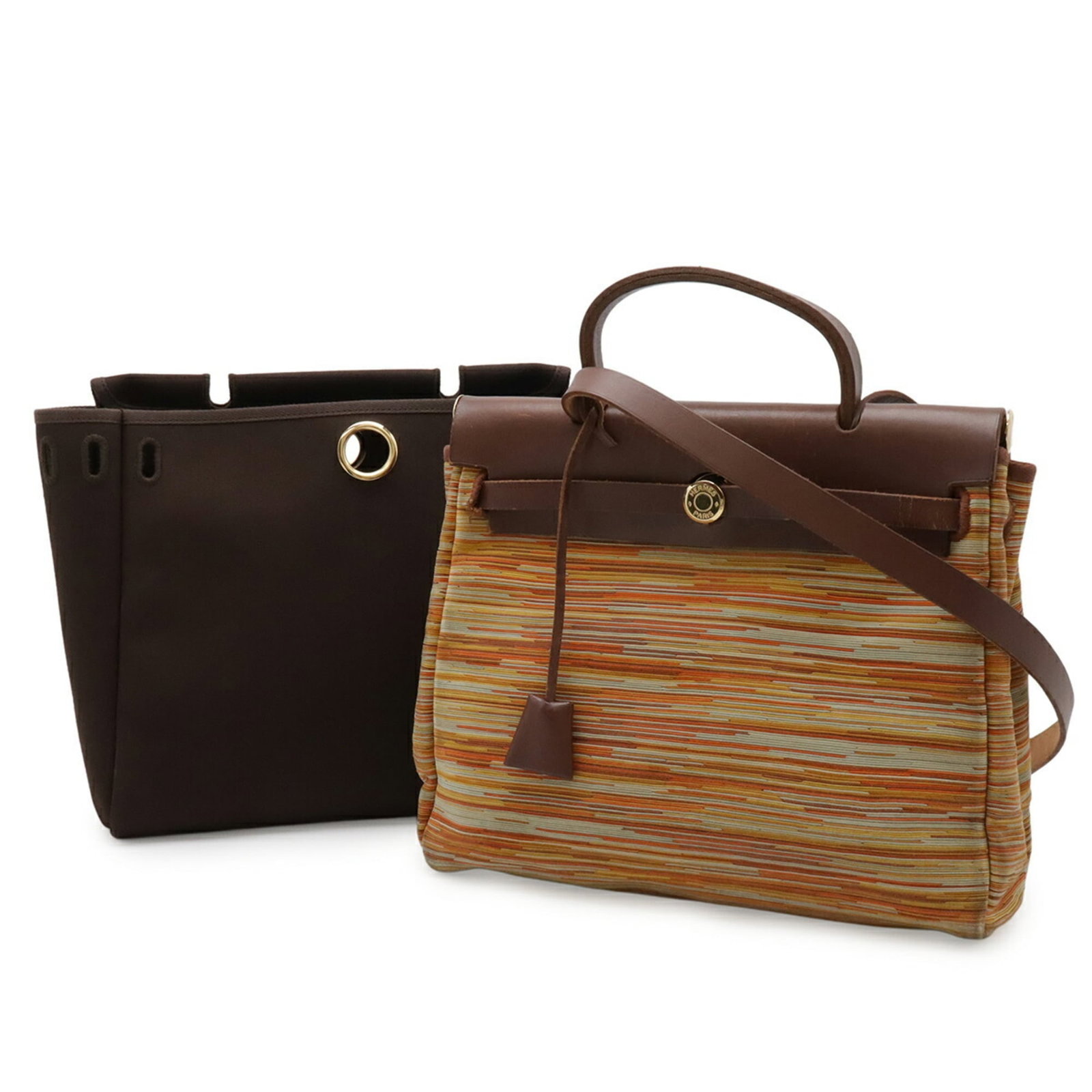 Hermes Leather Shoulder Bag: Hermes Leather Shoulder Bag A timeless and elegant Hermes leather shoulder bag, crafted from rich brown leather with a classic design that exudes sophistication. With its spacious interior and adjusta