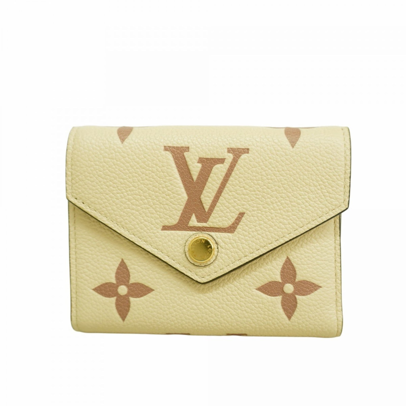 Louis Vuitton Tri-Fold Wallet: Louis Vuitton Tri-Fold Wallet A timeless piece of luxury, this Louis Vuitton tri-fold wallet exudes elegance with its classic cream color and iconic monogram pattern. With its spacious interior and du
