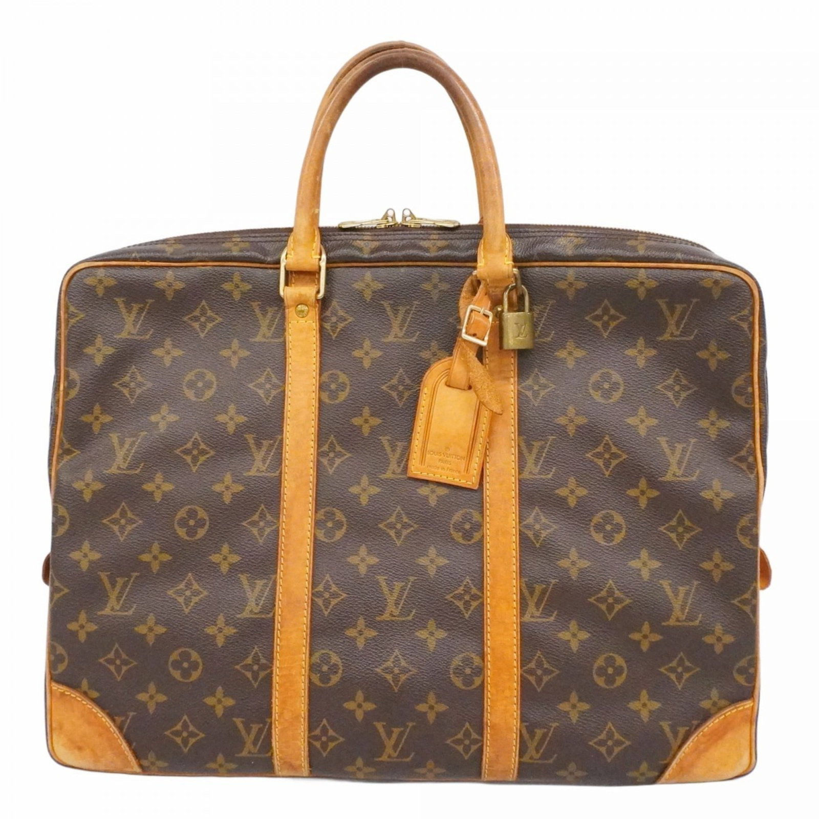 Briefcase Louis Vuitton: Briefcase Louis Vuitton A pre-owned Louis Vuitton briefcase in rich, worn brown leather, with subtle scratches and signs of usage adding to its patina. This classic design is perfect for the discernin