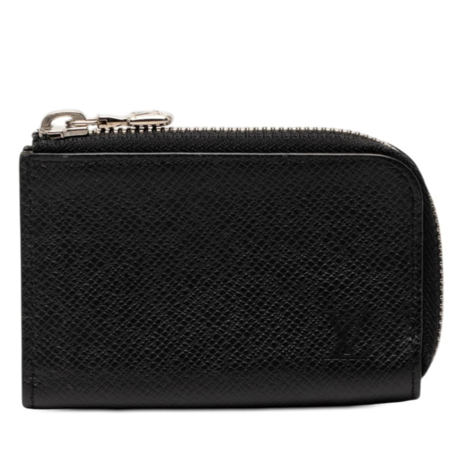 Louis Vuitton Coin Purse/ Case Leather: Louis Vuitton Coin Purse/ Case Leather A sleek and sophisticated accessory for the modern gentleman, this Louis Vuitton coin purse is crafted from rich black leather and boasts the iconic LV monogram