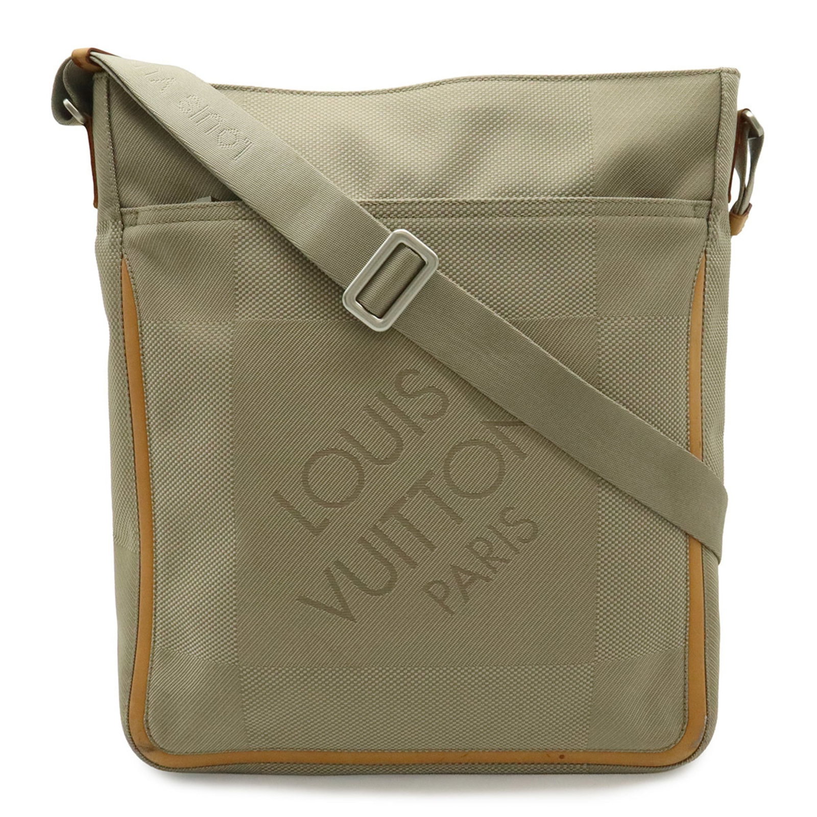Louis Vuitton Canvas Shoulder Bag: Louis Vuitton Canvas Shoulder Bag A timeless piece from the iconic Louis Vuitton brand, this beige canvas shoulder bag boasts classic LV monogramming and a spacious interior perfect for daily essentia