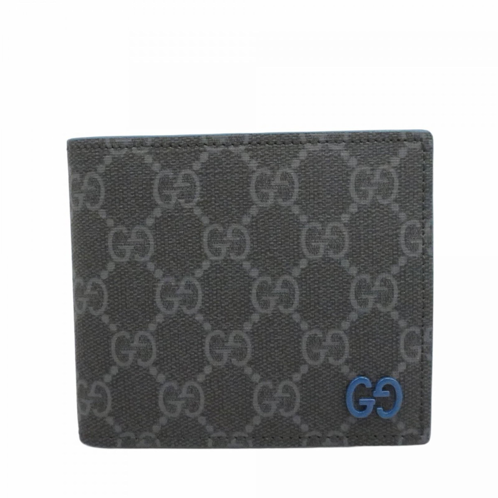 Gucci Bi-Fold Pvc Wallet: Gucci Bi-Fold Pvc Wallet A sleek and stylish Gucci bi-fold wallet, crafted from durable PVC material, is up for grabs. With its classic black and blue color options, this versatile accessory can easil