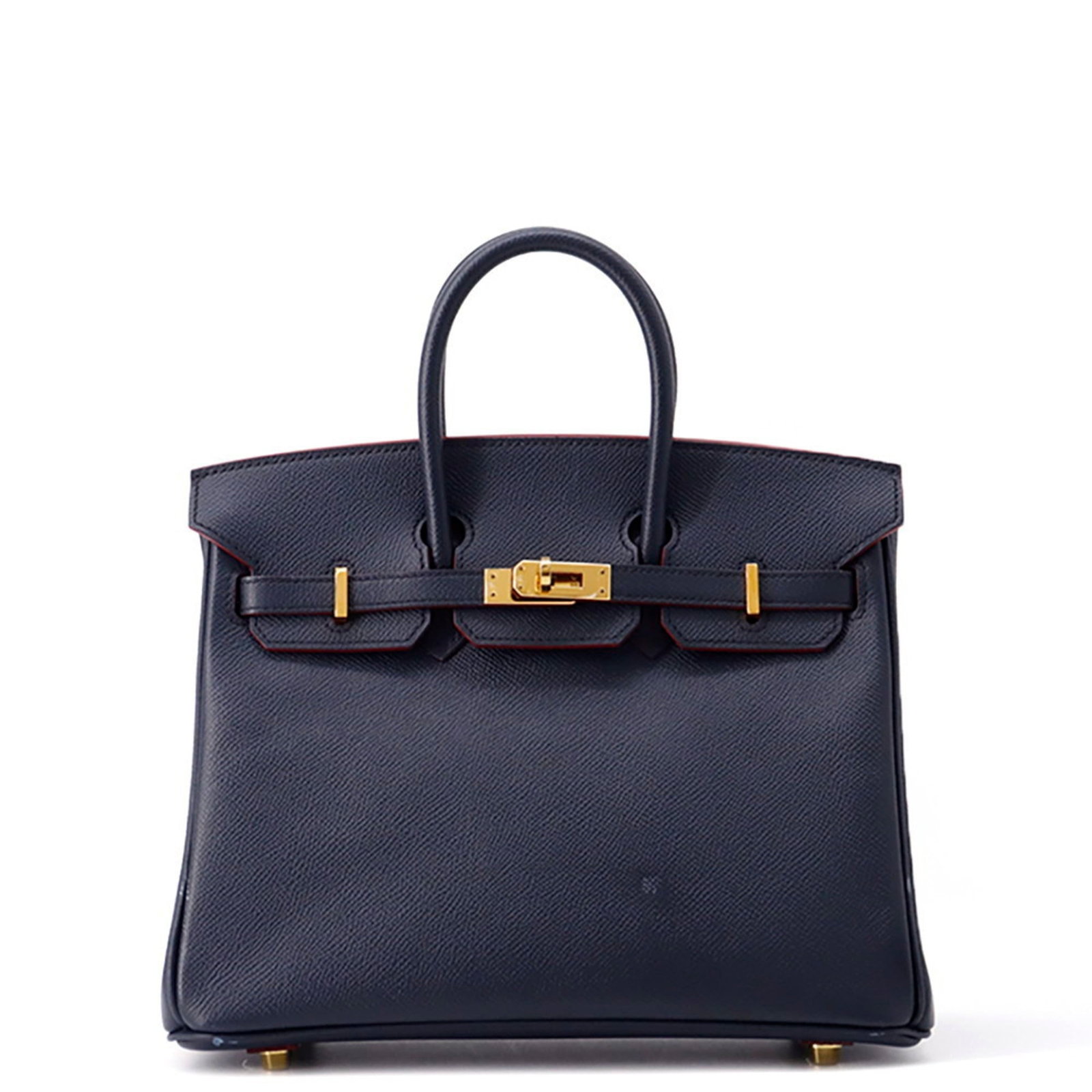 Hermes Epsom Leather Handbag: Hermes Epsom Leather Handbag A stunning Hermes Epsom Leather Handbag in rich blue indigo and rouge hues, boasting the iconic brand's signature craftsmanship and timeless style. With its classic design