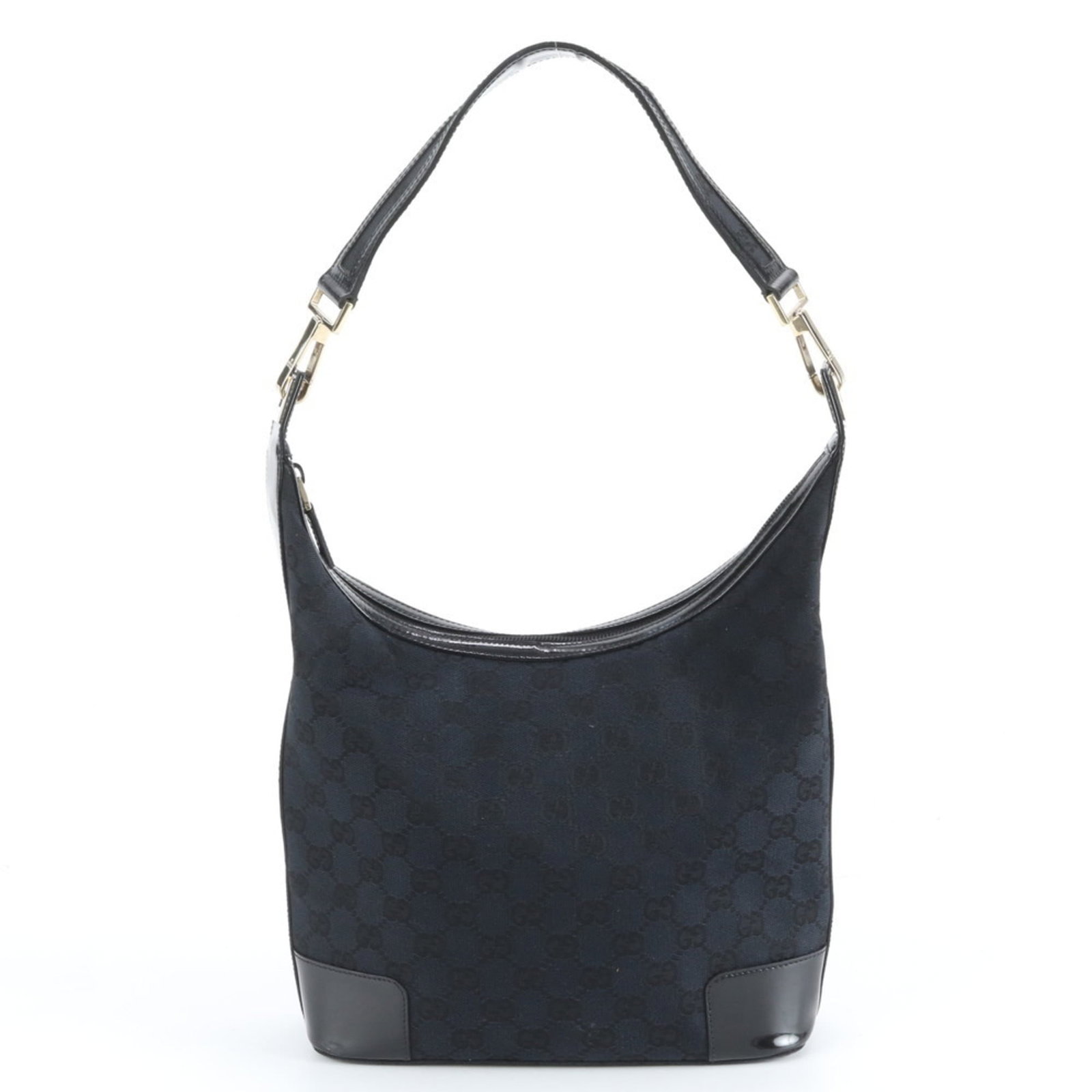 Gucci Canvas Leather Shoulder Bag: Gucci Canvas Leather Shoulder Bag A timeless Gucci shoulder bag in sleek black leather and canvas, perfect for adding an effortless touch of sophistication to any outfit. With its spacious interior an