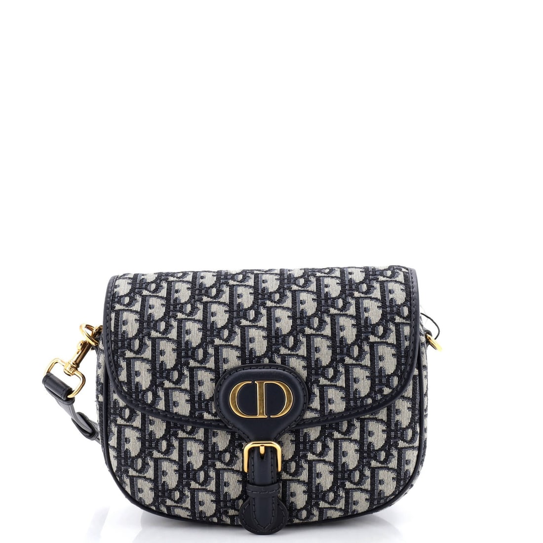 Christian Dior Bobby Flap Bag in Oblique Canvas Medium: Christian Dior Bobby Flap Bag in Oblique Canvas Medium The Christian Dior Bobby Flap Bag in Oblique Canvas Medium is a stunning, versatile accessory that exudes effortless chic. With its iconic