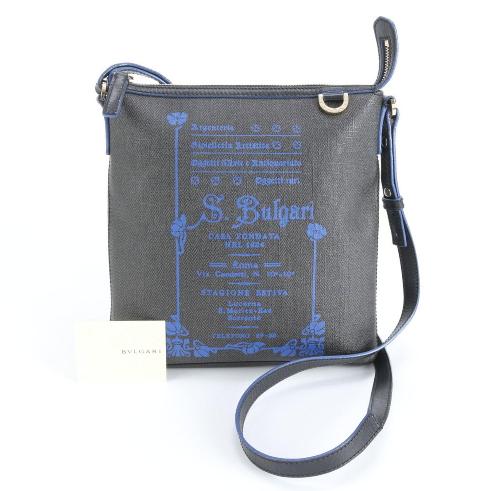 Bvlgari Coated Canvas Shoulder Bag in Leather: Bvlgari Coated Canvas Shoulder Bag in Leather Elevate your style with the Bvlgari Coated Canvas Shoulder Bag in Leather, a timeless piece that combines sleek sophistication with rugged charm. Made fro