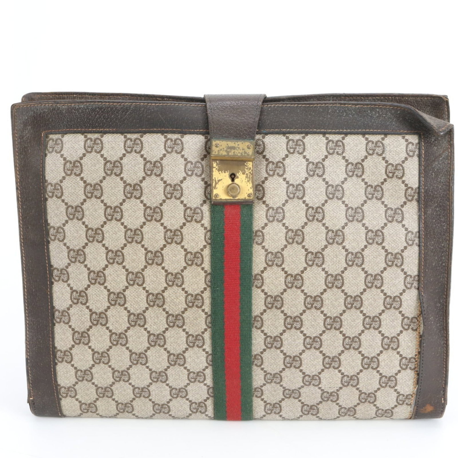 Gucci Clutch Bag in Leather and Coated Canvas: Gucci Clutch Bag in Leather and Coated Canvas A sleek and sophisticated Gucci clutch bag, crafted from rich leather and coated canvas, adds a touch of luxury to any evening outfit. With its classic br