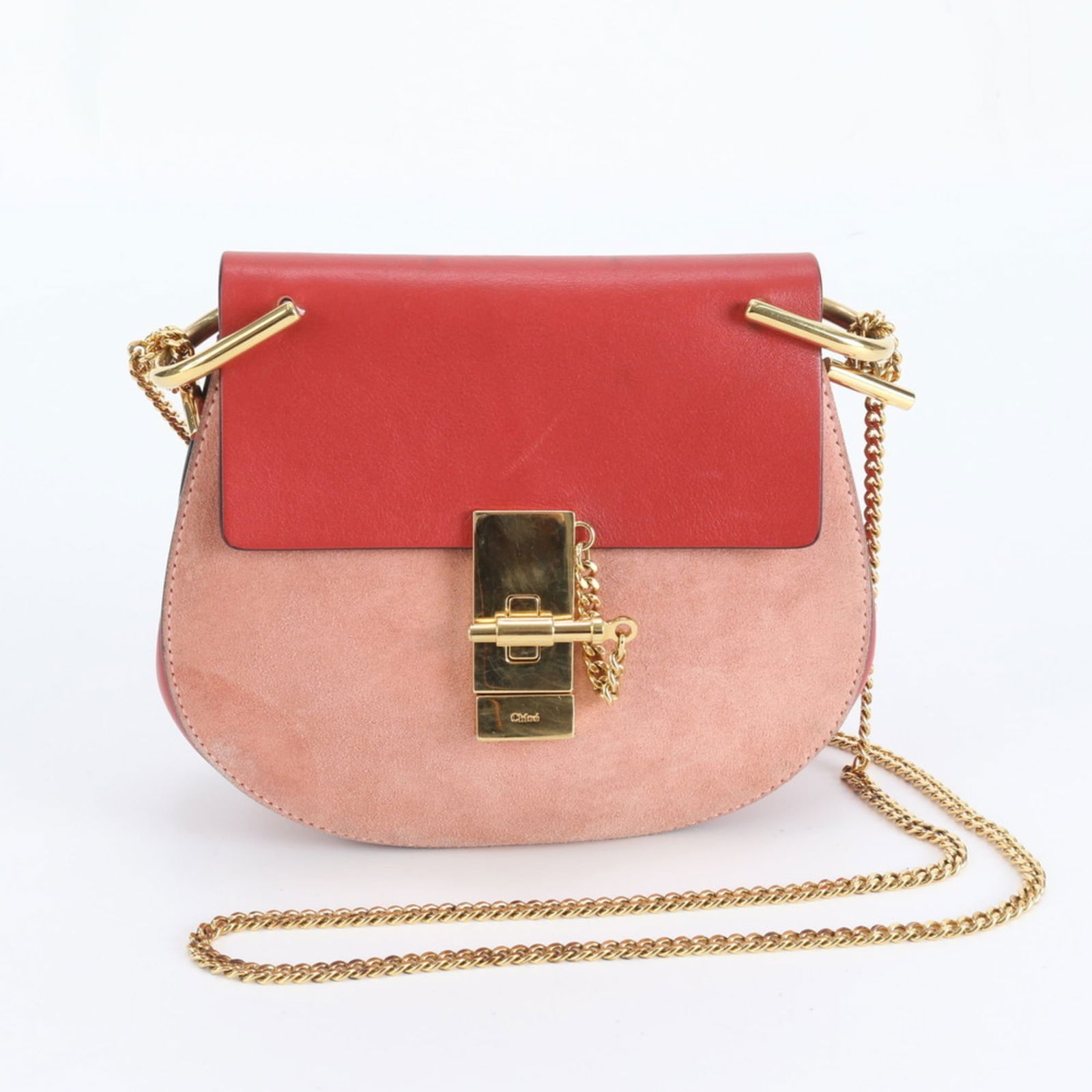Leather Chlo Shoulder Bag: Leather Chlo Shoulder Bag A stylish and versatile leather shoulder bag from Chlo, this pink or red beauty boasts sleek lines and a classic design that's perfect for adding a touch of sophistication to